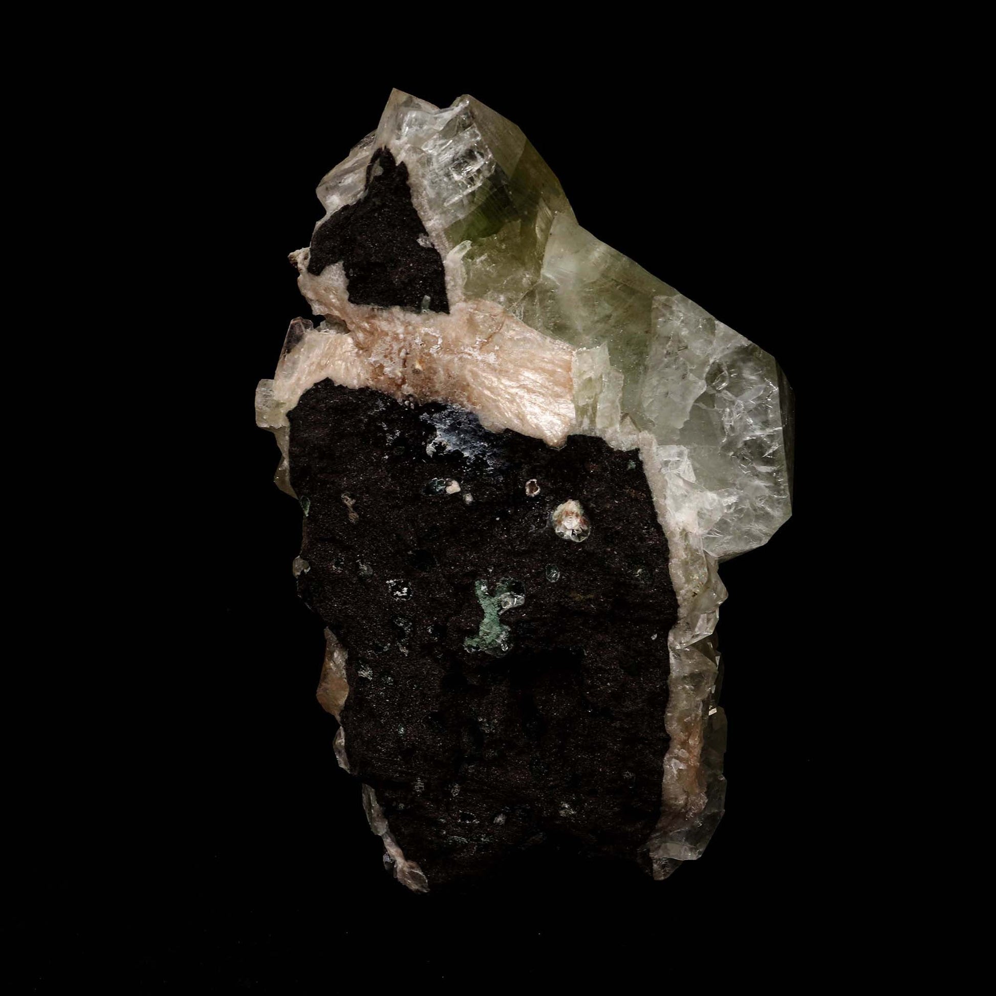 Green Apophyllite Cube Natural Mineral Specimen # B 5187  https://www.superbminerals.us/products/green-apophyllite-cube-natural-mineral-specimen-b-5187  Features: This outstanding huge mounded combination from Jalgaon's recent findings is highlighted by a magnificent color-zoned apophyllite crystal bordered by lesser crystals of the same type.The rich mint-green centres and colourless terminations on the glassy, translucent tetragonal apophyllites are offset