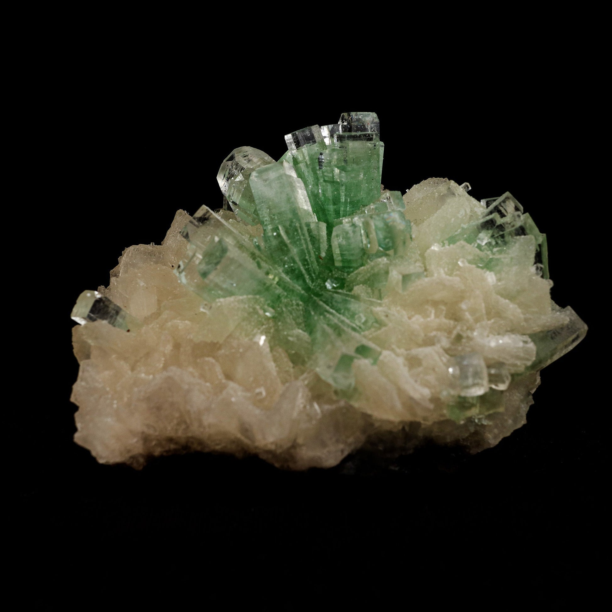 Green Apophyllite Disco Ball with Stilbite Natural Mineral Specimen #…  https://www.superbminerals.us/products/green-apophyllite-disco-ball-with-stilbite-natural-mineral-specimen-b-5120  Features: The finding of these spectacular fluorapophyllite "disco balls" while excavating huge diameter water wells is without a doubt one of the Deccan Traps' Great Finds.A "small ball" over... "ball" of densely intergrown, gemmy, highly glassy, mint-green to colourless tetragonal crystals with pinacoidal termination