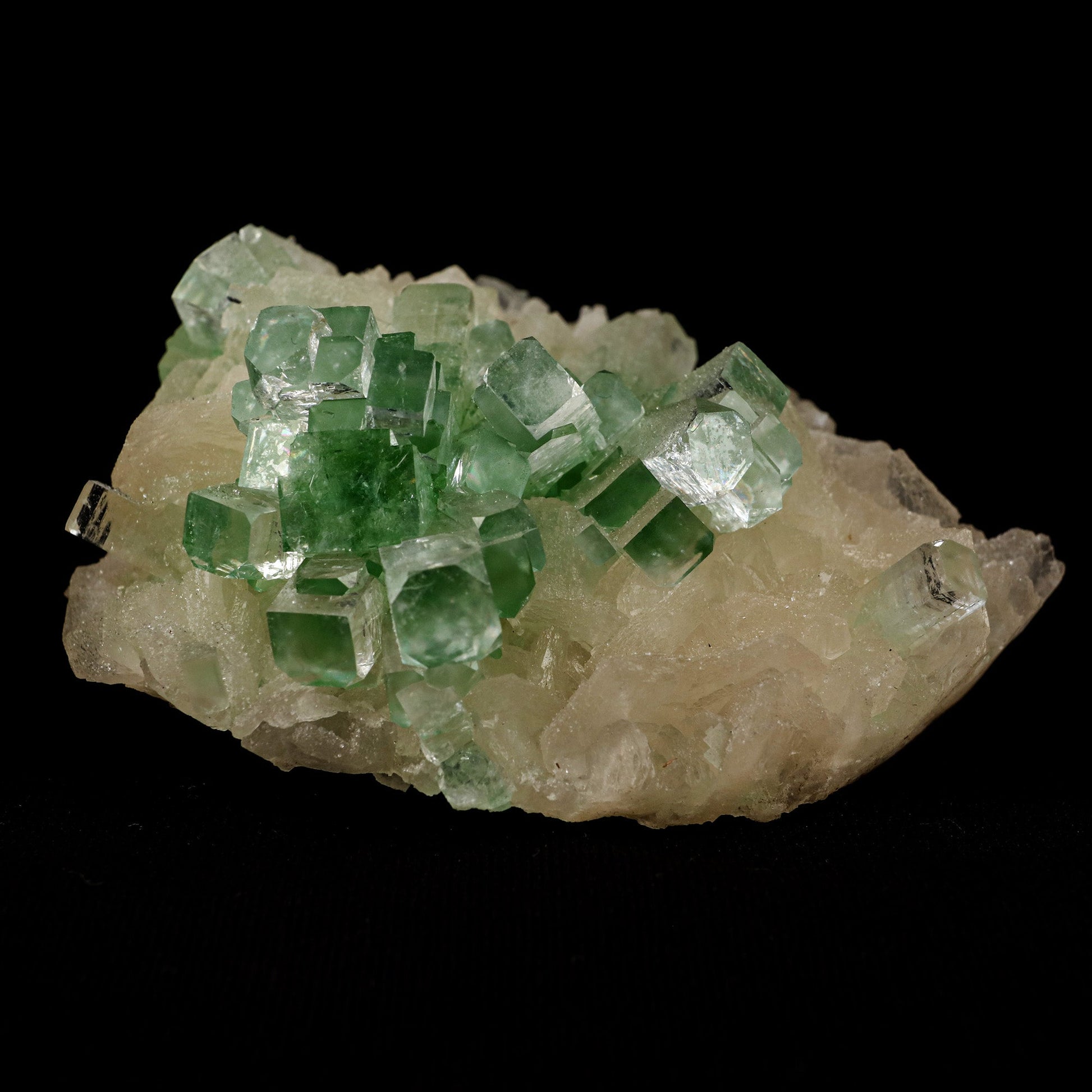 Green Apophyllite Disco Ball with Stilbite Natural Mineral Specimen #…  https://www.superbminerals.us/products/green-apophyllite-disco-ball-with-stilbite-natural-mineral-specimen-b-5120  Features: The finding of these spectacular fluorapophyllite "disco balls" while excavating huge diameter water wells is without a doubt one of the Deccan Traps' Great Finds.A "small ball" over... "ball" of densely intergrown, gemmy, highly glassy, mint-green to colourless tetragonal crystals with pinacoidal termination
