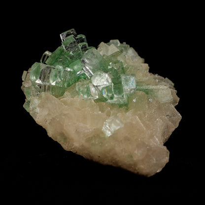 Green Apophyllite Disco Ball with Stilbite Natural Mineral Specimen #…  https://www.superbminerals.us/products/green-apophyllite-disco-ball-with-stilbite-natural-mineral-specimen-b-5120  Features: The finding of these spectacular fluorapophyllite "disco balls" while excavating huge diameter water wells is without a doubt one of the Deccan Traps' Great Finds.A "small ball" over... "ball" of densely intergrown, gemmy, highly glassy, mint-green to colourless tetragonal crystals with pinacoidal termination
