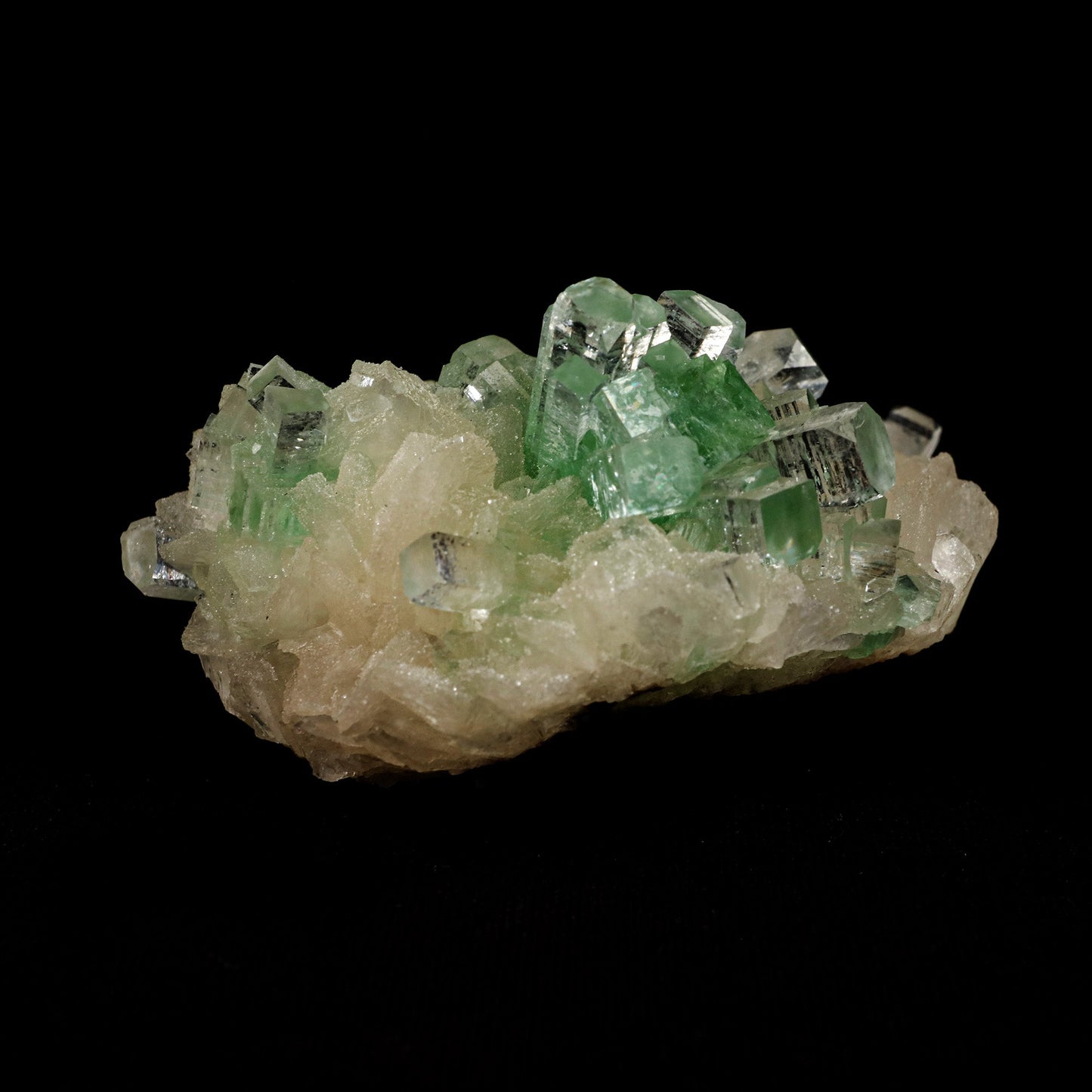 Green Apophyllite Disco Ball with Stilbite Natural Mineral Specimen #…  https://www.superbminerals.us/products/green-apophyllite-disco-ball-with-stilbite-natural-mineral-specimen-b-5120  Features: The finding of these spectacular fluorapophyllite "disco balls" while excavating huge diameter water wells is without a doubt one of the Deccan Traps' Great Finds.A "small ball" over... "ball" of densely intergrown, gemmy, highly glassy, mint-green to colourless tetragonal crystals with pinacoidal termination