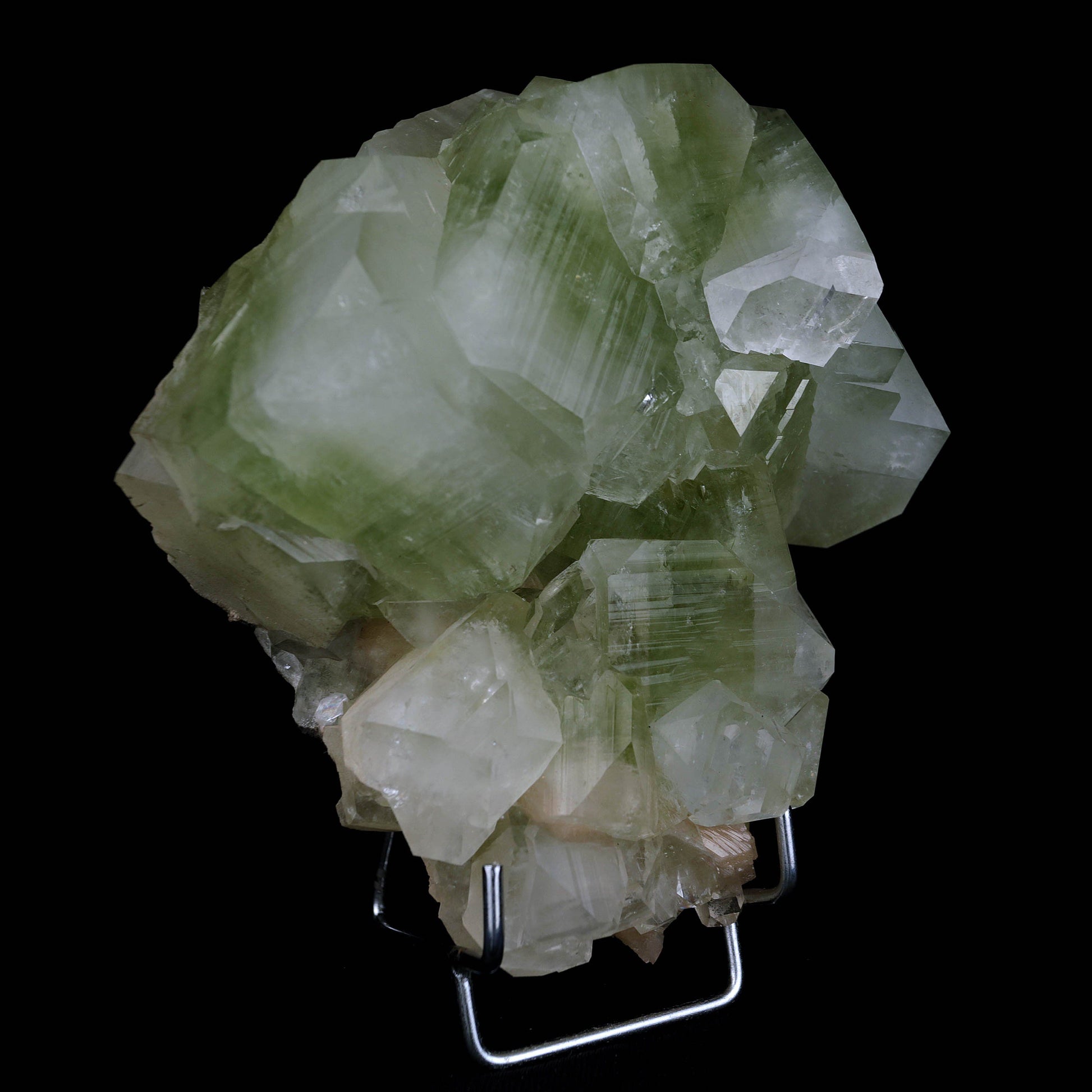 Green Apophyllite Terminate Cubes with Stilbite Natural Mineral Specim…  https://www.superbminerals.us/products/green-apophyllite-terminate-cubes-with-stilbite-natural-mineral-specimen-b-4485  Features:Fluorapophyllite crystals with soft peach coloured Stilbite crystals on minor matrix from Jalgaon of excellent grade, classic, sharp, extremely glossy, doubly terminated. A bright blazing green hue dominates the middle of the Apophyllite group, whereas the ends of the Apophyllite.