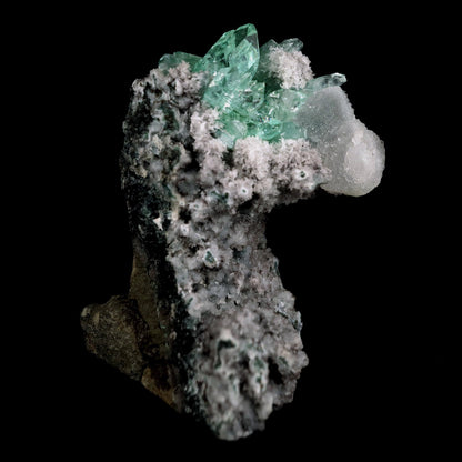 Green Apophyllite with Coated Calcite on Black Chalcedony Natural Mine… https://www.superbminerals.us/products/green-apophyllite-with-coated-calcite-on-black-chalcedony-natural-mineral-specimen-b-4600 Features:An exceptionally sculptural and impressive large combination zeolite specimen from Aurangabad. The very well prepared deep triangular vug in basalt matrix is lined with sparkly, bubbly, drusy gray chalcedony. The striking and aesthetic mound in the middle hosts pearlescent