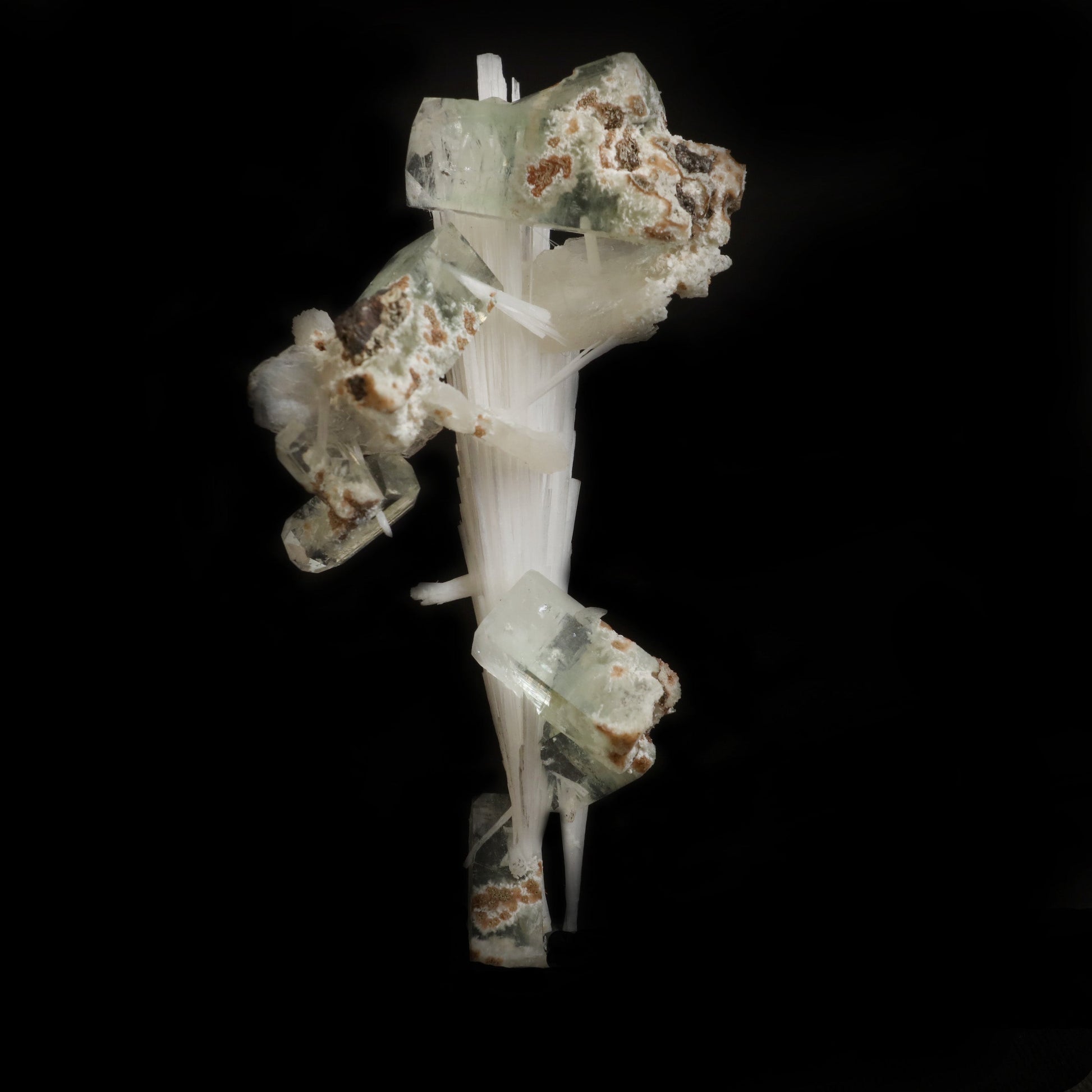 Green Apophyllite with Scolecite Sprays Natural Mineral Specimen # B …  https://www.superbminerals.us/products/green-apophyllite-with-scolecite-sprays-natural-mineral-specimen-b-5019  Features:&nbsp;A massive spray of elongated colourless Scolecite crystals. A little fragment of matrix is connected, along with a small Stilbite crystal and light green apophyllite crystals.Scolecite crystals have a glassy appearance and are highly translucent, with transparent terminations. 