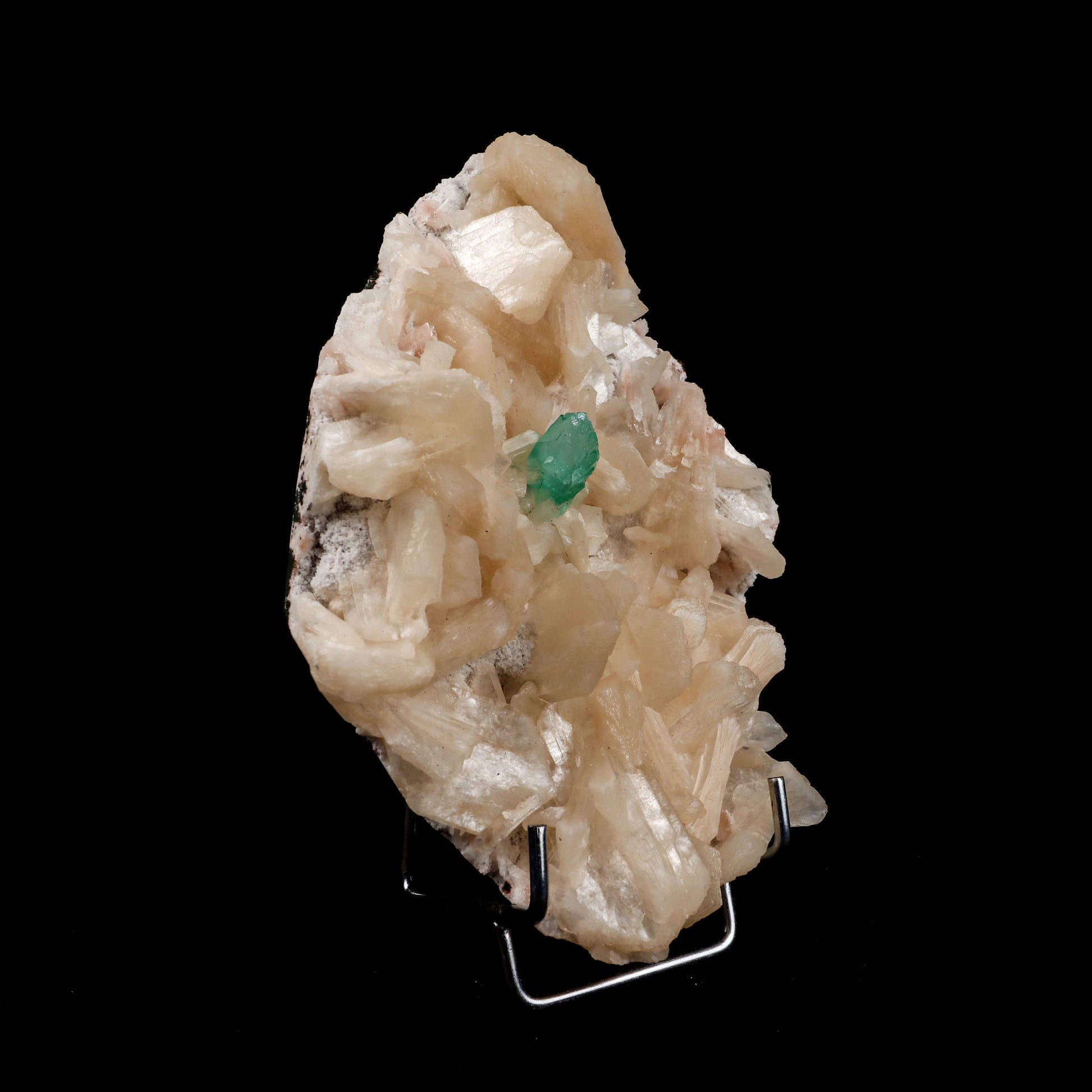 Green Apophyllite with Stilbite Natural Mineral Specimen # B 4995  https://www.superbminerals.us/products/green-apophyllite-with-stilbite-natural-mineral-specimen-b-4995  Features:&nbsp;Transparent green apophyllite crystals long with lustrous crystal faces and steep pyramidal terminations on matrix coated with lustrous peach-baggie coloured Stilbite crystals of varying sizes. Primary Mineral(s): ApophylliteSecondary Mineral(s): StilbiteMatrix: N/A 7 Inch x 5 InchWeight : 968 