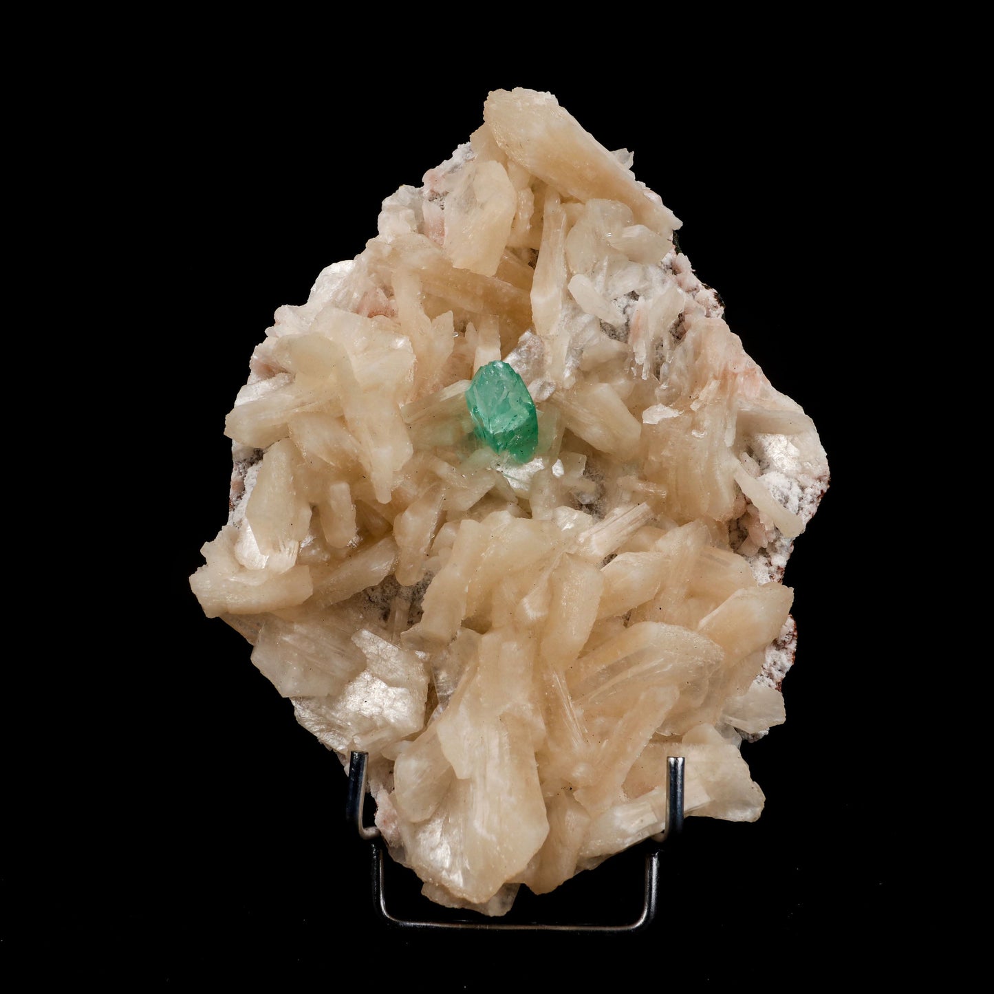 Green Apophyllite with Stilbite Natural Mineral Specimen # B 4995  https://www.superbminerals.us/products/green-apophyllite-with-stilbite-natural-mineral-specimen-b-4995  Features:&nbsp;Transparent green apophyllite crystals long with lustrous crystal faces and steep pyramidal terminations on matrix coated with lustrous peach-baggie coloured Stilbite crystals of varying sizes. Primary Mineral(s): ApophylliteSecondary Mineral(s): StilbiteMatrix: N/A 7 Inch x 5 InchWeight : 968 