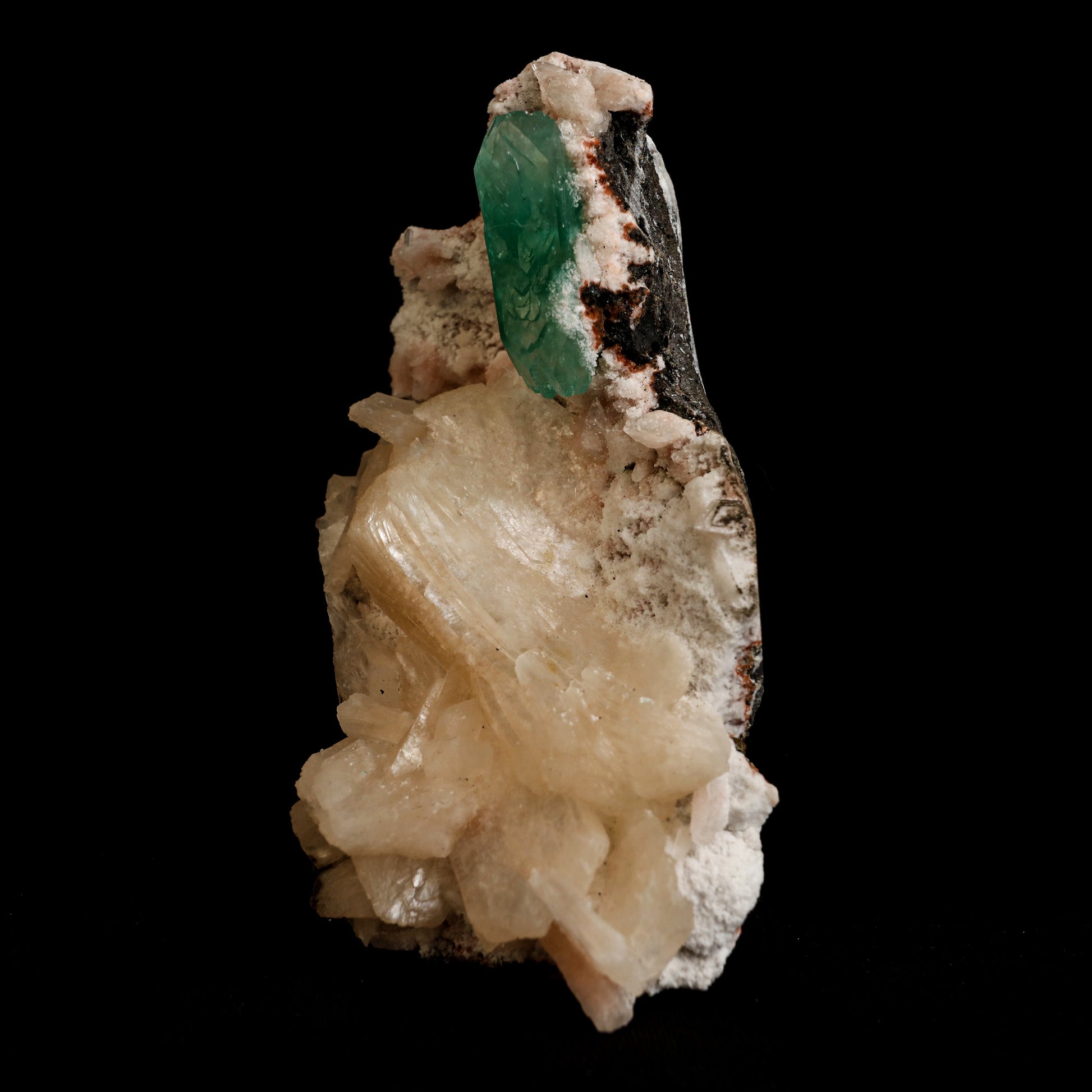 Green Apophyllite with Stilbite Natural Mineral Specimen # B 5045  https://www.superbminerals.us/products/green-apophyllite-with-stilbite-natural-mineral-specimen-b-5045  Features: Transparent green apophyllite crystals long with lustrous crystal faces and steep pyramidal terminations on matrix coated with lustrous peach-baggie coloured Stilbite crystals of varying sizes. Primary Mineral(s): Apophyllite