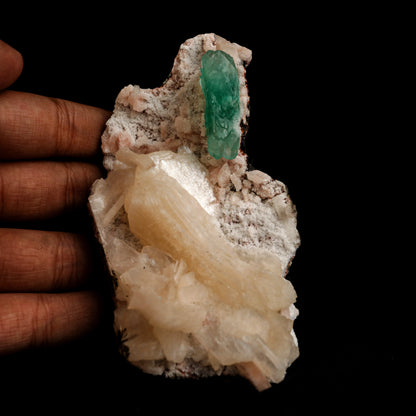 Green Apophyllite with Stilbite Natural Mineral Specimen # B 5045  https://www.superbminerals.us/products/green-apophyllite-with-stilbite-natural-mineral-specimen-b-5045  Features: Transparent green apophyllite crystals long with lustrous crystal faces and steep pyramidal terminations on matrix coated with lustrous peach-baggie coloured Stilbite crystals of varying sizes. Primary Mineral(s): Apophyllite