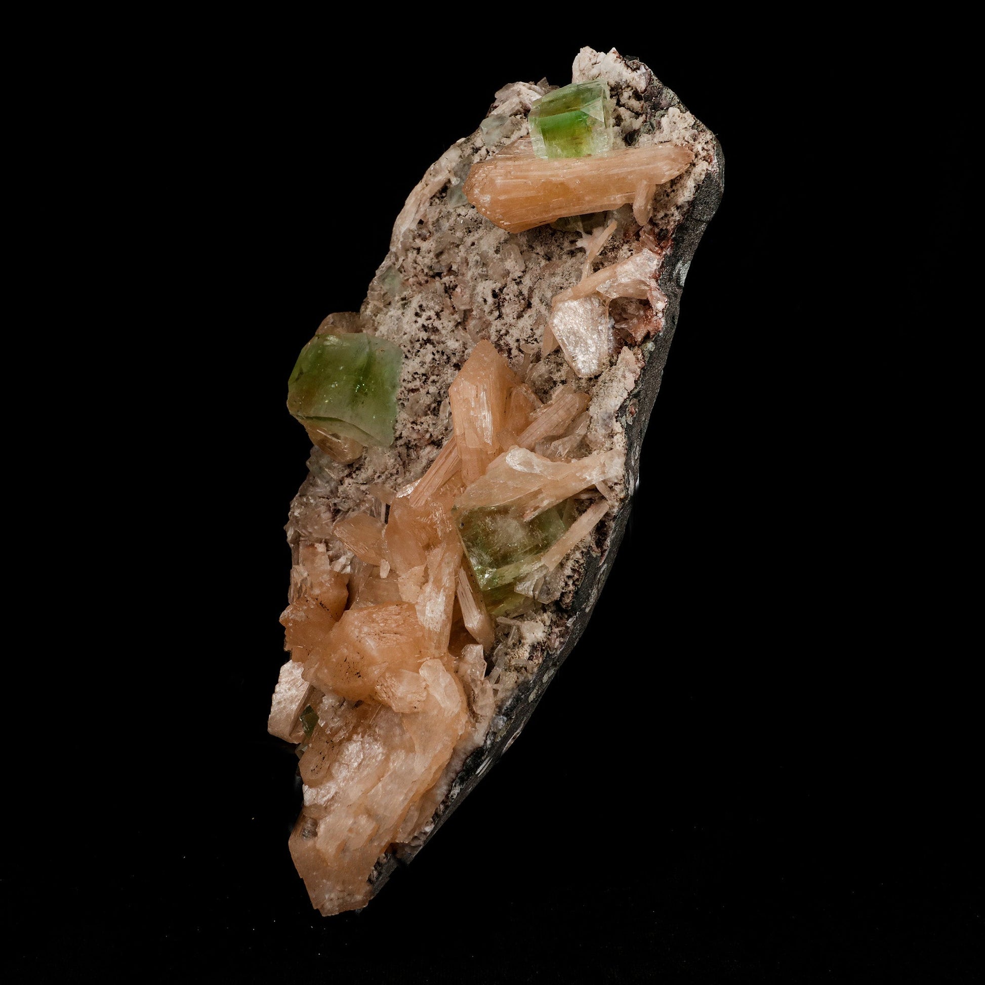 Green Apophyllite with Stilbite Natural Mineral Specimen # B 5090  https://www.superbminerals.us/products/green-apophyllite-with-stilbite-natural-mineral-specimen-b-5090  Features: A very aesthetic piece featuring a matrix densely coated with miniature, beige Stilbite crystals with a cluster of lustrous, larger light-beige Stilbite crystals at the base, all hosting a crown of transparent, mint-green Apophyllite pseudocubic (rectangular) crystals. Great contrast, color, symmetry 