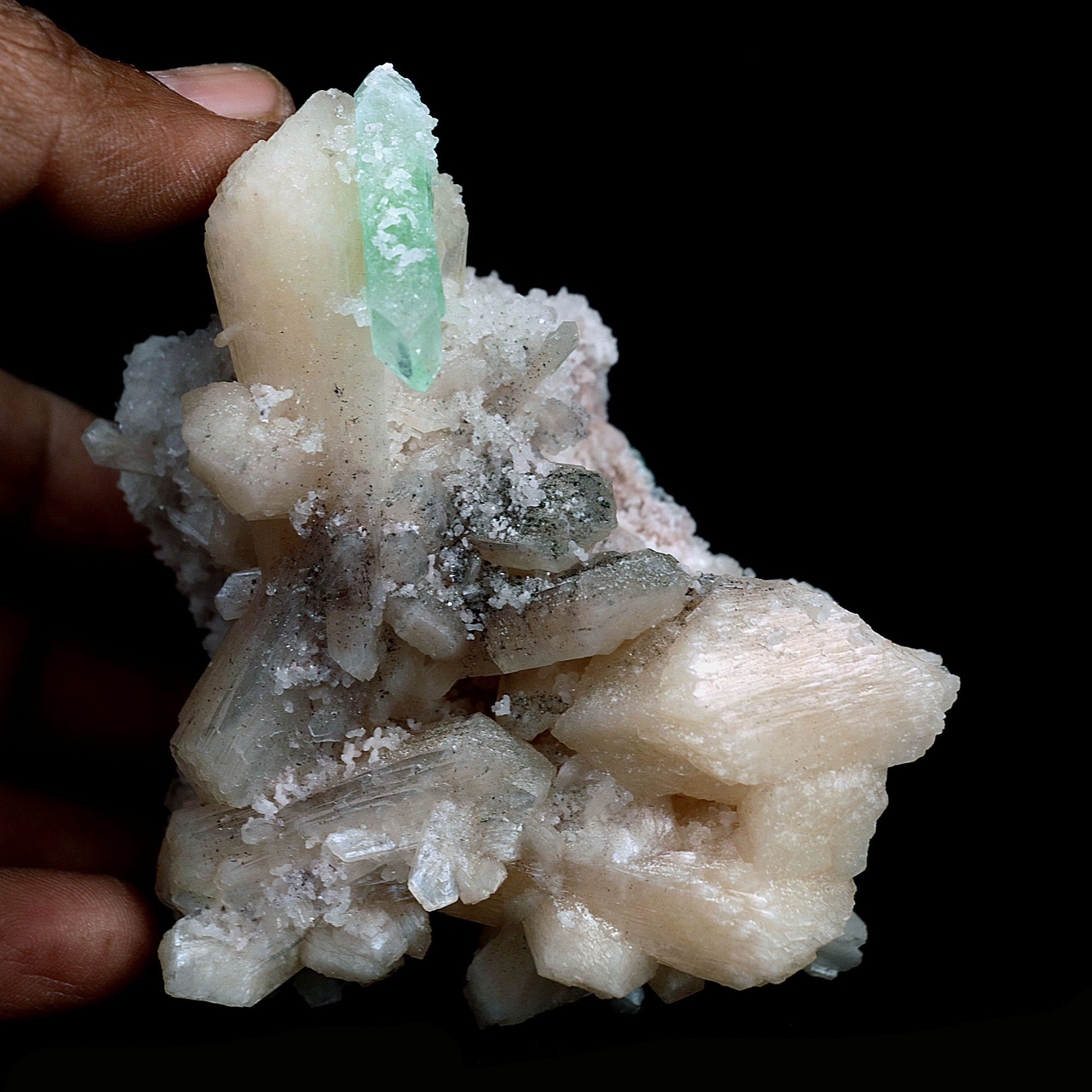 Green Apophyllite with Stilbite on Chalcedony Natural Mineral Specimen…  https://www.superbminerals.us/products/green-apophyllite-with-stilbite-on-chalcedony-natural-mineral-specimen-b-4116  Features:The specimen consists of striking, strongly lustrous, transparent and gem, rich green Apophyllite crystals growing in a beautiful spray. The quality of the Apophyllite is tremendous - transparent, limpid, perfect sharp pyramidal terminations and water clear. Small Stilbite crystals are seen too. In superb