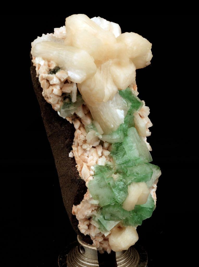 Green Apophyllite with Stilbite on Heulandite Natural Minerals Specime…  https://www.superbminerals.us/products/green-apophyllite-with-stilbite-on-heulandite-natural-minerals-specimen-b-2122  Features: A very aesthetic piece featuring a matrix densely coated with miniature, beige Stilbite crystals with a cluster of lustrous, larger light-beige Stilbite crystals at the base, all hosting a crown of transparent, mint-green Apophyllite pseudocubic (rectangular) crystals. Great contrast, color, symmetry 