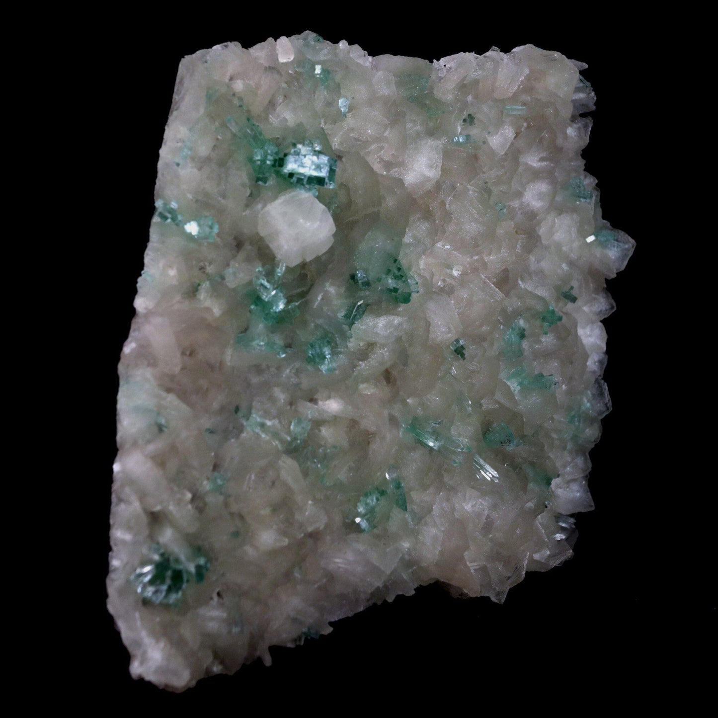 Green Apophyllite with Stilbite, Powellite Rare Find Natural Mineral S…  https://www.superbminerals.us/products/green-apophyllite-with-stilbite-powellite-rare-find-natural-mineral-specimen-b-4768  Features: We have a striking crystal perched elegantly in apophyllite and stilbite crystal nests that are elongated and dramatic! This is a noteworthy specimen in terms of the powellite's own size and the combination's overall appearance. The crystal is a double-terminated, transparent, satiny powellite crystal 
