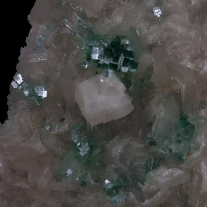 Green Apophyllite with Stilbite, Powellite Rare Find Natural Mineral S…  https://www.superbminerals.us/products/green-apophyllite-with-stilbite-powellite-rare-find-natural-mineral-specimen-b-4768  Features: We have a striking crystal perched elegantly in apophyllite and stilbite crystal nests that are elongated and dramatic! This is a noteworthy specimen in terms of the powellite's own size and the combination's overall appearance. The crystal is a double-terminated, transparent, satiny powellite crystal 