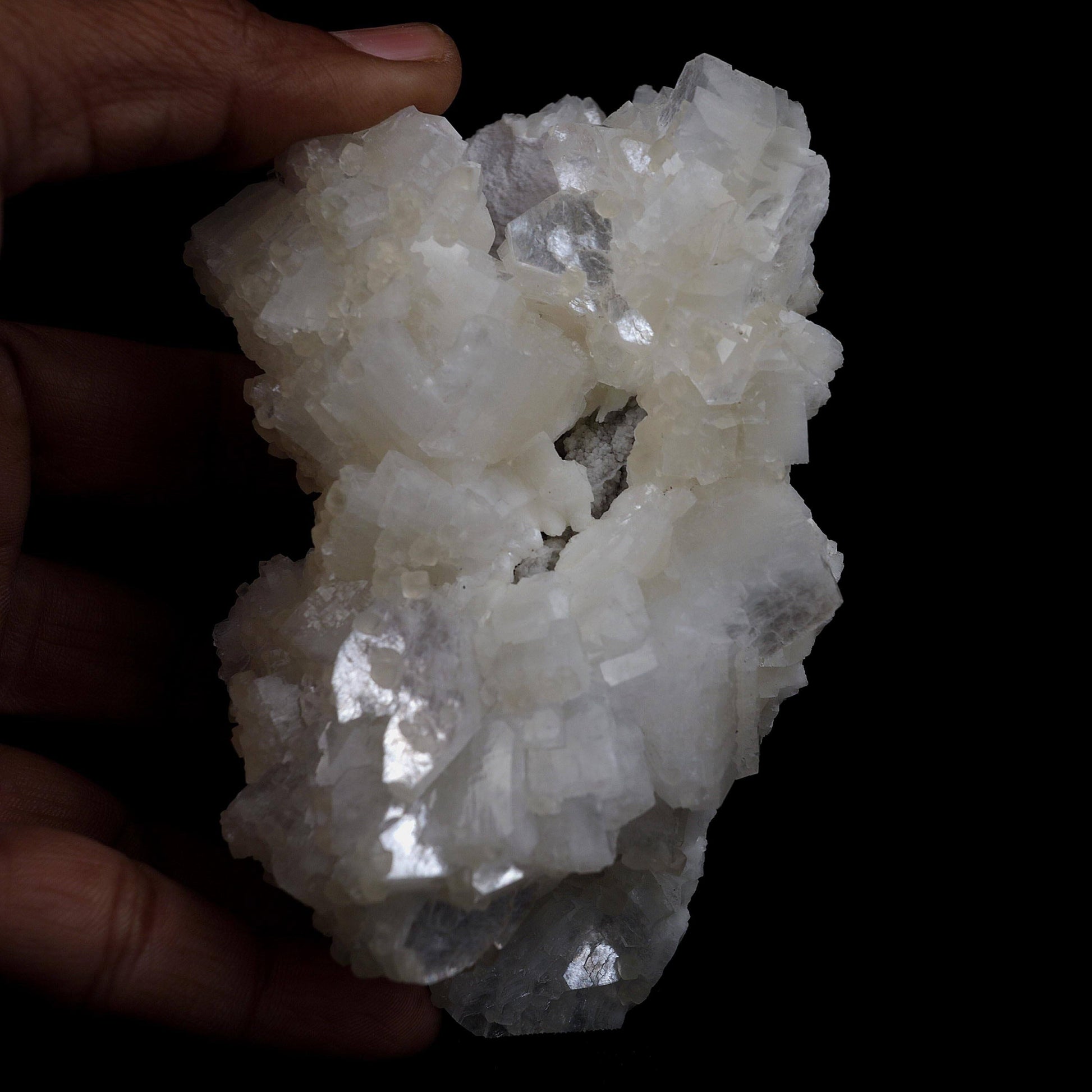 Heulandite, Calcite with Mordenite Natural Mineral Specimen # B 4510  https://www.superbminerals.us/products/heulandite-calcite-with-mordenite-natural-mineral-specimen-b-4510  Features:Calcite tabular crystals and mordenite crystals form a unique relationship over a bed of heulandite crystals that cover the whole cavity. It was found in Maharashtra, India, in a basalt pocket. Primary Mineral(s): HeulanditeSecondary Mineral(s): Calcite, MordeniteMatrix: N/A11 cm x 6 cmWeight : 270 Gms