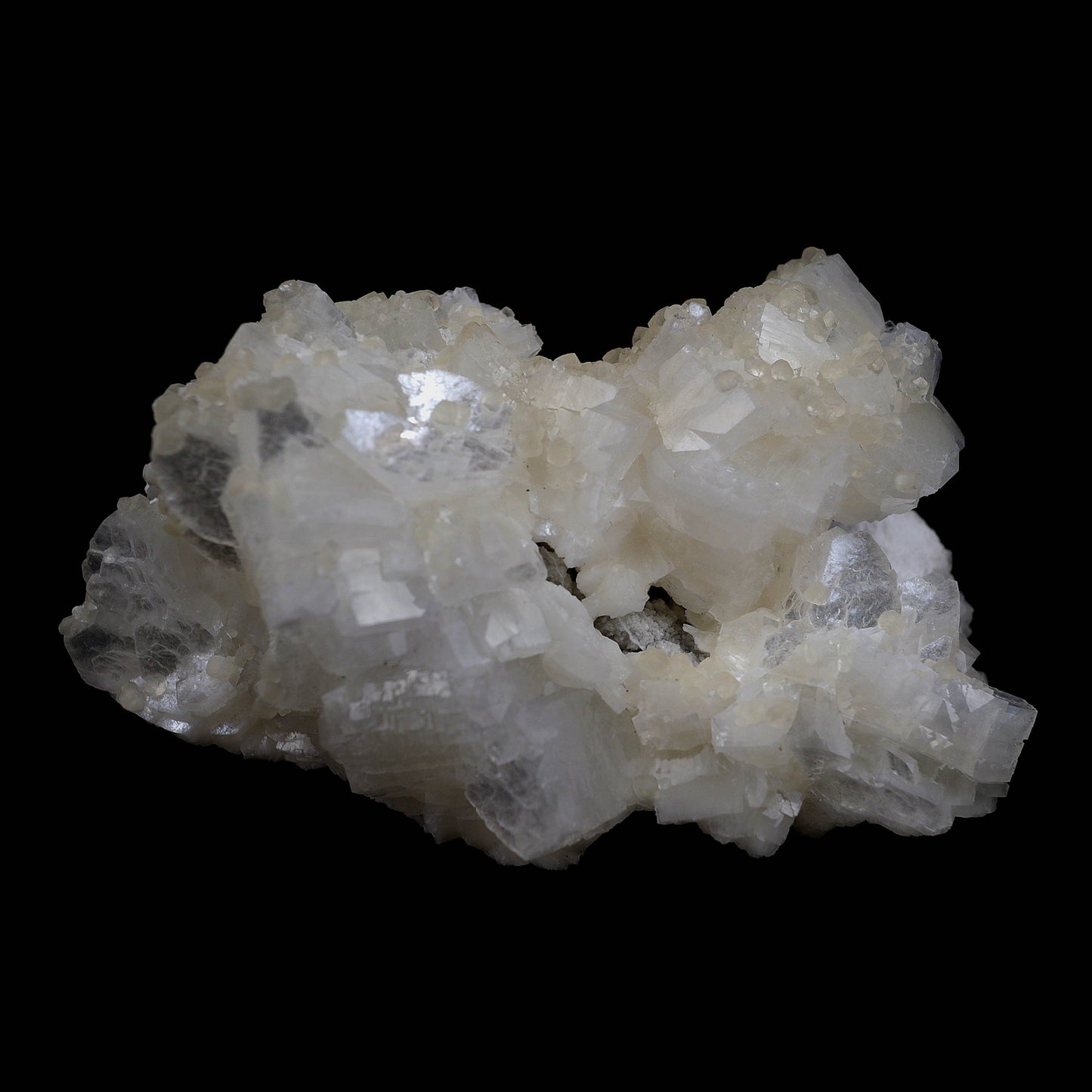 Heulandite, Calcite with Mordenite Natural Mineral Specimen # B 4510  https://www.superbminerals.us/products/heulandite-calcite-with-mordenite-natural-mineral-specimen-b-4510  Features:Calcite tabular crystals and mordenite crystals form a unique relationship over a bed of heulandite crystals that cover the whole cavity. It was found in Maharashtra, India, in a basalt pocket. Primary Mineral(s): HeulanditeSecondary Mineral(s): Calcite, MordeniteMatrix: N/A11 cm x 6 cmWeight : 270 Gms