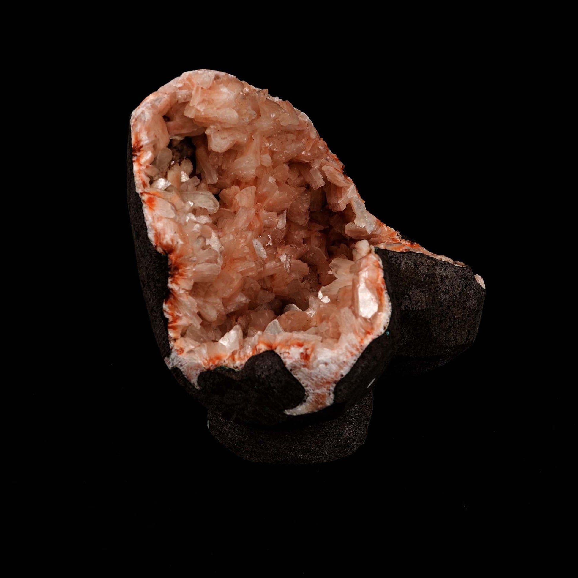 Heulandite Crystal Geode Natural Mineral Specimen # B 5190  https://www.superbminerals.us/products/heulandite-crystal-geode-natural-mineral-specimen-b-5190  Features: Beautiful Peach Heulandite Cluster. Heulandite belongs to the Zeolite family and crystallizes in tabular, trapezoid, granular, and massive forms. Heulandite comes in a variety of colors. Primary Mineral(s): Heulandite Secondary Mineral(s): N/AMatrix: N/A 5 Inch x 4 InchWeight : 690 GmsLocality: Aurangabad