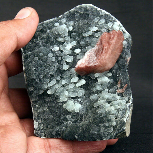 Heulandite Crystal on Stalactite of Chalcedony Natural Minerals Specim…  https://www.superbminerals.us/products/heulandite-crystal-on-stalactite-of-chalcedony-natural-minerals-specimen-b-1405  Features: A striking doubly terminated heulandite crystal is dramatically set in the sculptural, well-prepared vug in basalt lined with strikingly contrasting sparkly gray drusy chalcedony. The stunning glassy, pearlescent, translucent parallel-growth bladed heulandite has beautiful rich coral-pink color