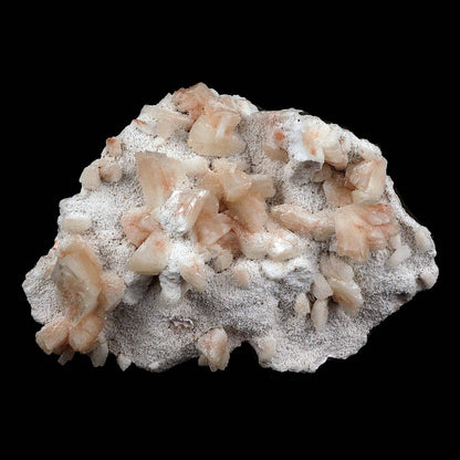 Heulandite crystals on Mordenite Natural Mineral Specimen # B 3722  https://www.superbminerals.us/products/heulandite-crystals-on-mordenite-natural-mineral-specimen-b-3722  Features:This neat specimen from India appears to be a combination of a heulandite crystal and chalcedony stalactites. Heulandite usually occurs in a very glossy pyramidal type crystal. This is a very nice specimen with no damage to the crystal. Peach colored crystals of heulandite on a white mordenite matrix. 