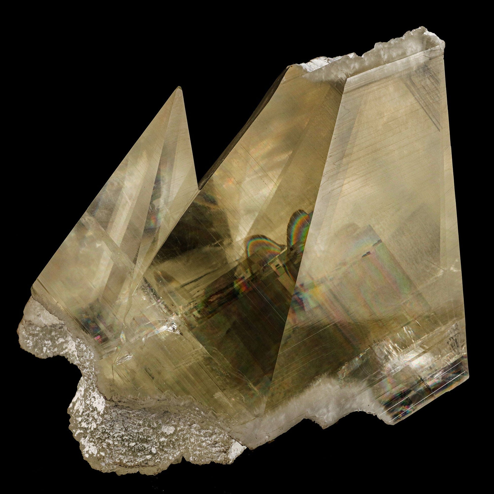 Calcite with champagne color, supreme clarity, and rainbows from light refraction. Museum quality natural specimen discovered near Jalgaon, accidentally, in a well pocket being drilled on farmland.