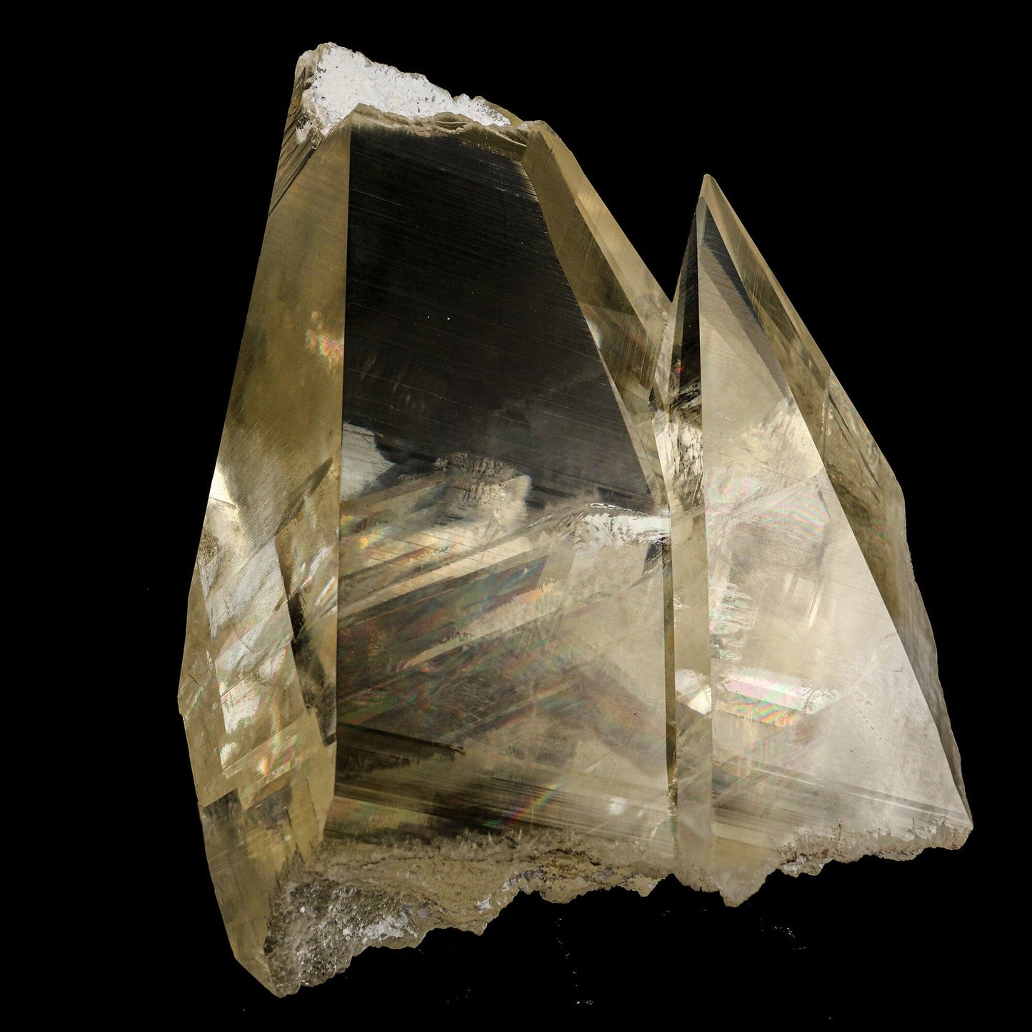 Calcite with champagne color, supreme clarity, and rainbows from light refraction. Museum quality natural specimen discovered near Jalgaon, accidentally, in a well pocket being drilled on farmland.