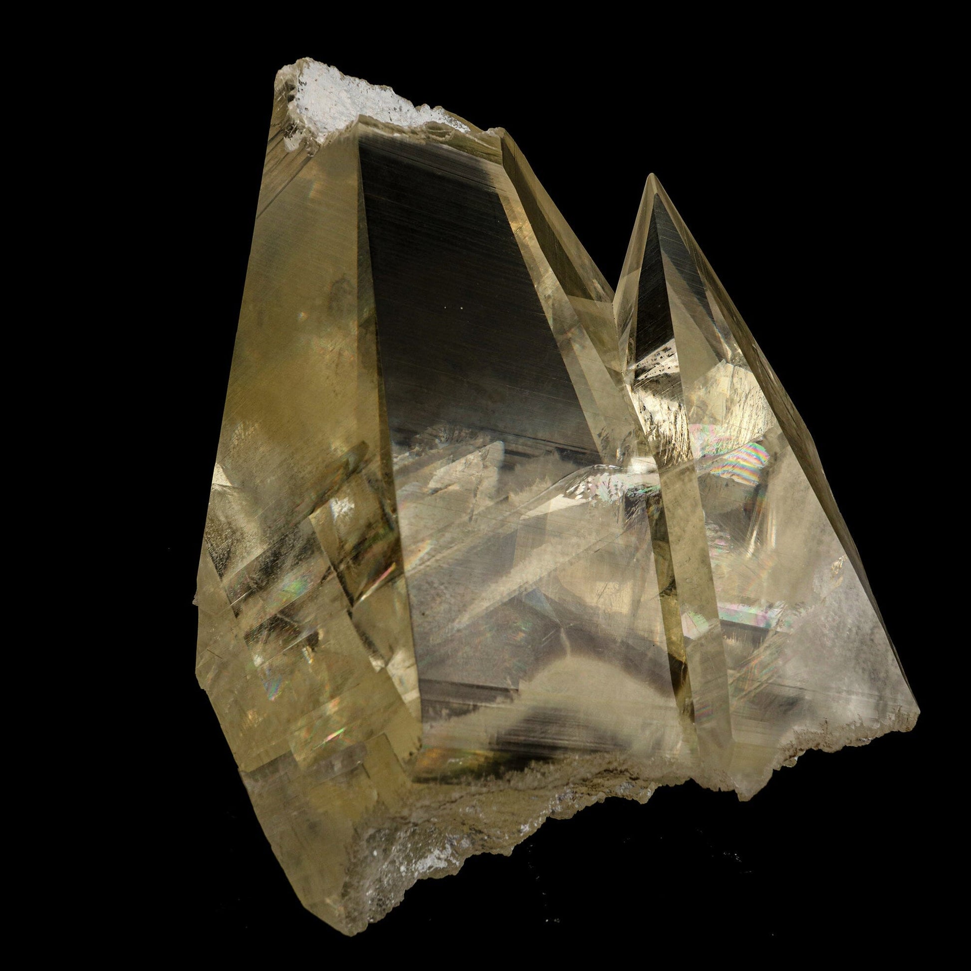 Calcite with champagne color, supreme clarity, and rainbows from light refraction. Museum quality natural specimen discovered near Jalgaon, accidentally, in a well pocket being drilled on farmland.