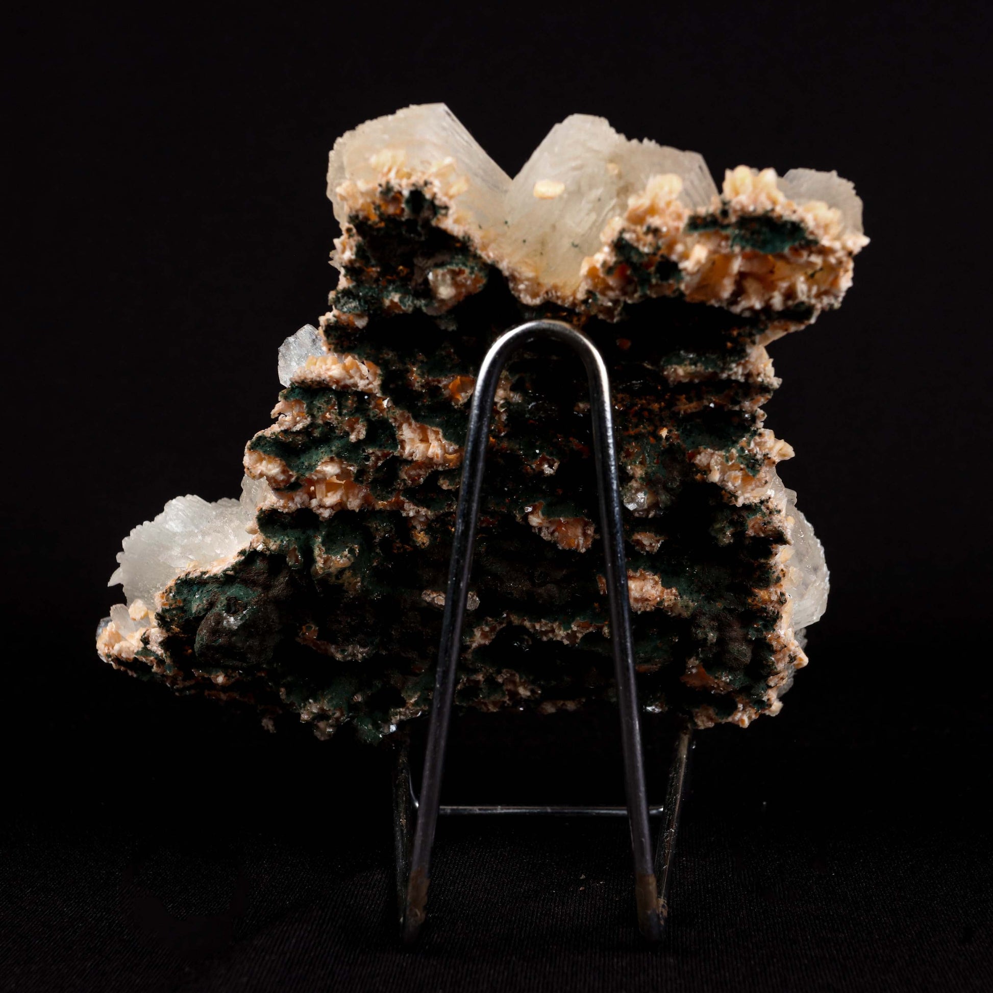 lustrous Terminated Stilbite Natural Mineral Specimen # B 4989  https://www.superbminerals.us/products/lustterorus-terminated-stilbite-natural-mineral-specimen-b-4989  Features:&nbsp;Featuring many excellent quality bladed groups of Stilbite in a soft white hue, resting over pearly stalactitic formations of peach colored Heulandite, this piece is a stunning example of the material. The sculpture is really flashy and three-dimensional, and I particularly like how the Stilbites