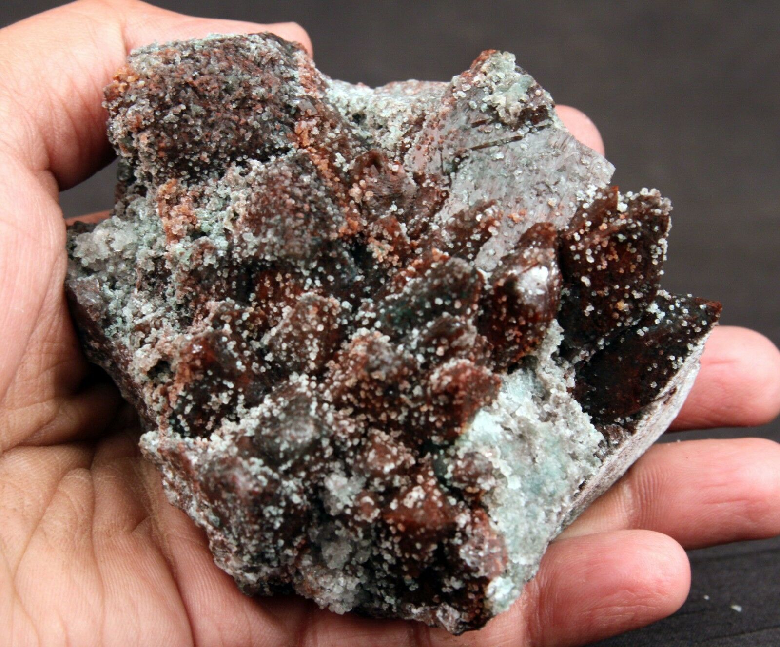 Marshy Apophyllite Pointed Crystals Natural Minerals Specimen # B 1360  https://www.superbminerals.us/products/marshy-apophyllite-pointed-crystals-natural-minerals-specimen-b-1360  Features: A very aesthetic specimen which has a flower shaped cluster of radiating marshy green apophyllite crystals occuring on a base of brown prismatic crystals of Apophylite. Green color of apophylite is due to inclusions of celadonite and whereas&nbsp; brown color of the apophylite is the result of haematite