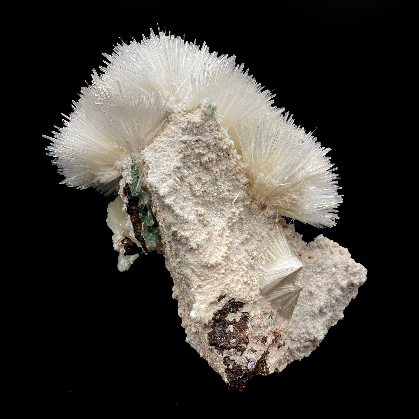 Mesolite flower formation with calcite tips, green apophyllite, and stilbite inclusions. Museum quality natural mineral specimen from Nasik, Maharashtra, India on the Deccan Plateau.