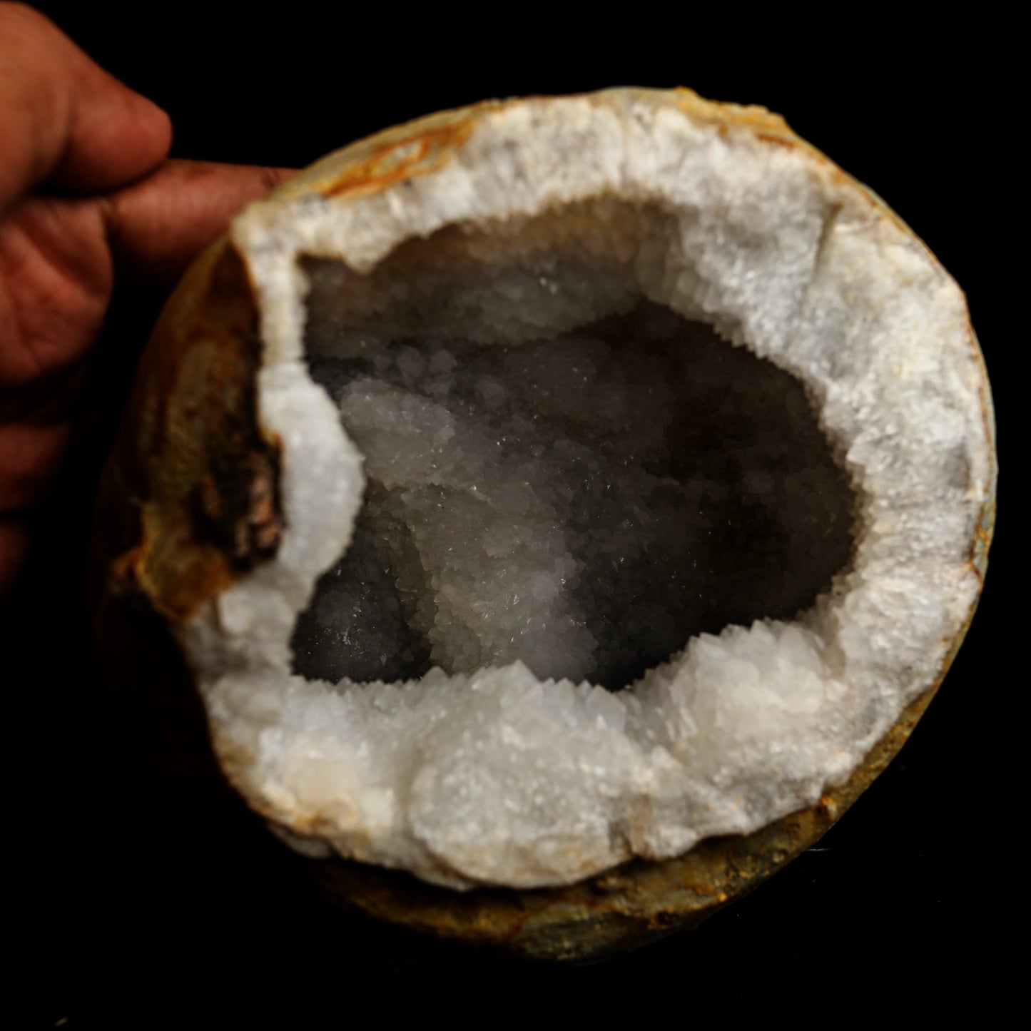 MM Quartz Geode Natural Mineral Specimen # B 5061  https://www.superbminerals.us/products/mm-quartz-geode-natural-mineral-specimen-b-5061  Features: With a geode lined with beige, glossy MM Quartz crystals, this is a beautiful piece. The crystals have a glossy, almost crystalline sheen to them, and their edges are sharp. This item has a gleaming sheen to it.