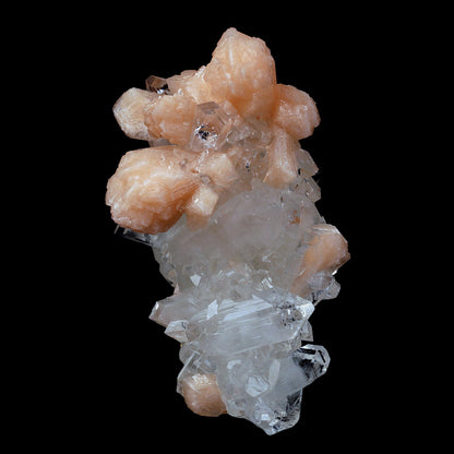 Peach Stilbite on Sprakling Apophyllite Crystals Natural Mineral Speci…  https://www.superbminerals.us/products/peach-stilbite-on-sprakling-apophyllite-crystals-natural-mineral-specimen-b-4054  Features:Classic combination specimen from the basalt trap rock quarries of India featuring a Fluorapophyllite crystal cluster with a Stilbite bowtie! While common in general, this is really a special piece - more beautiful and sparkly than most. The Fluorapophyllite is glassy, transparent to translucent