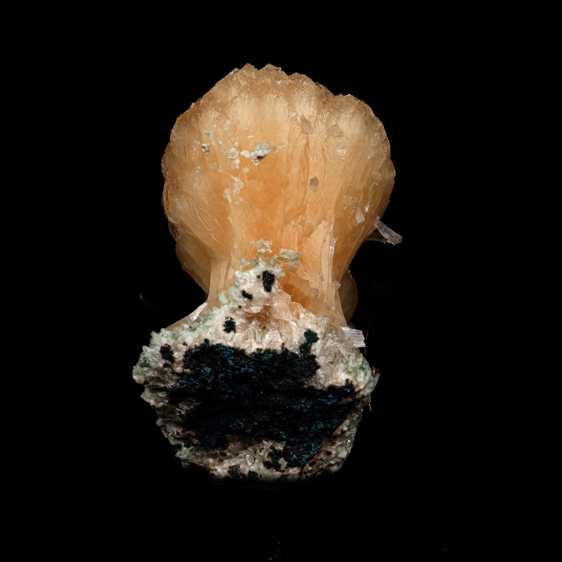 Pink Stilbite Bow Tie Cluster Natural Mineral Specimen # B 5281  https://www.superbminerals.us/products/pink-stilbite-bow-tie-cluster-natural-mineral-specimen-b-5281  Features: Stilbite from the traprock quarries in Jalgaon, India, is a stunning, lustrous, translucent, salmon-pink "bow tie." It is a common material in principle, but this piece stands out for its color and form! This is a common Zeolite species that has a classic bowtie shape, and yet has exceptional color