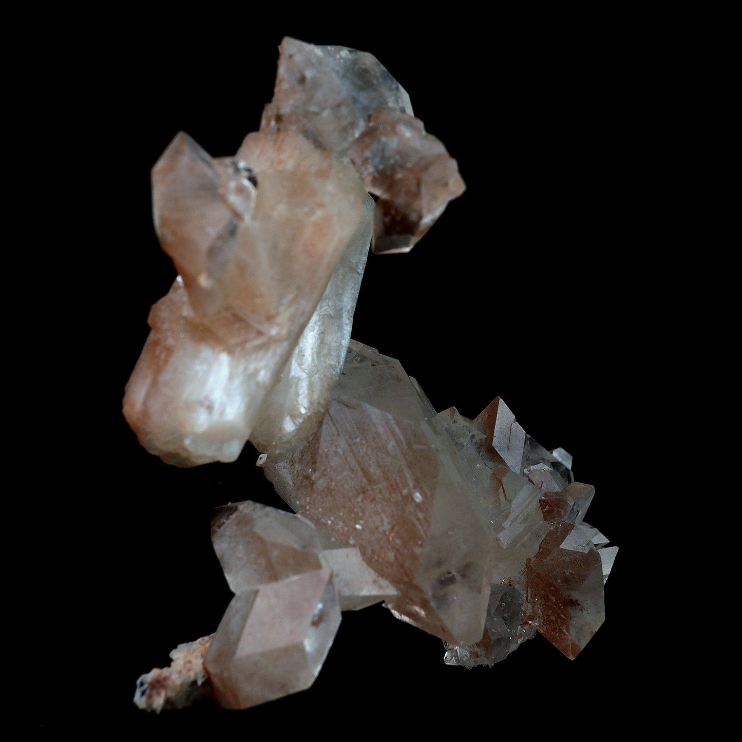 Pointed Apophyllite with Stilbite On Chalcedony Natural Mineral # B 41…  https://www.superbminerals.us/products/pointed-apophyllite-with-stilbite-on-chalcedony-natural-mineral-b-4176  Features:This specimen is mainly composed of the white/clear Apophyllite with inclusions of red hematite which transform partially red crystal and accented with the beautiful peachy colored stilbite that grew along with it. That being said, it was pieced back together seamlessly and is an extraordinary specimen