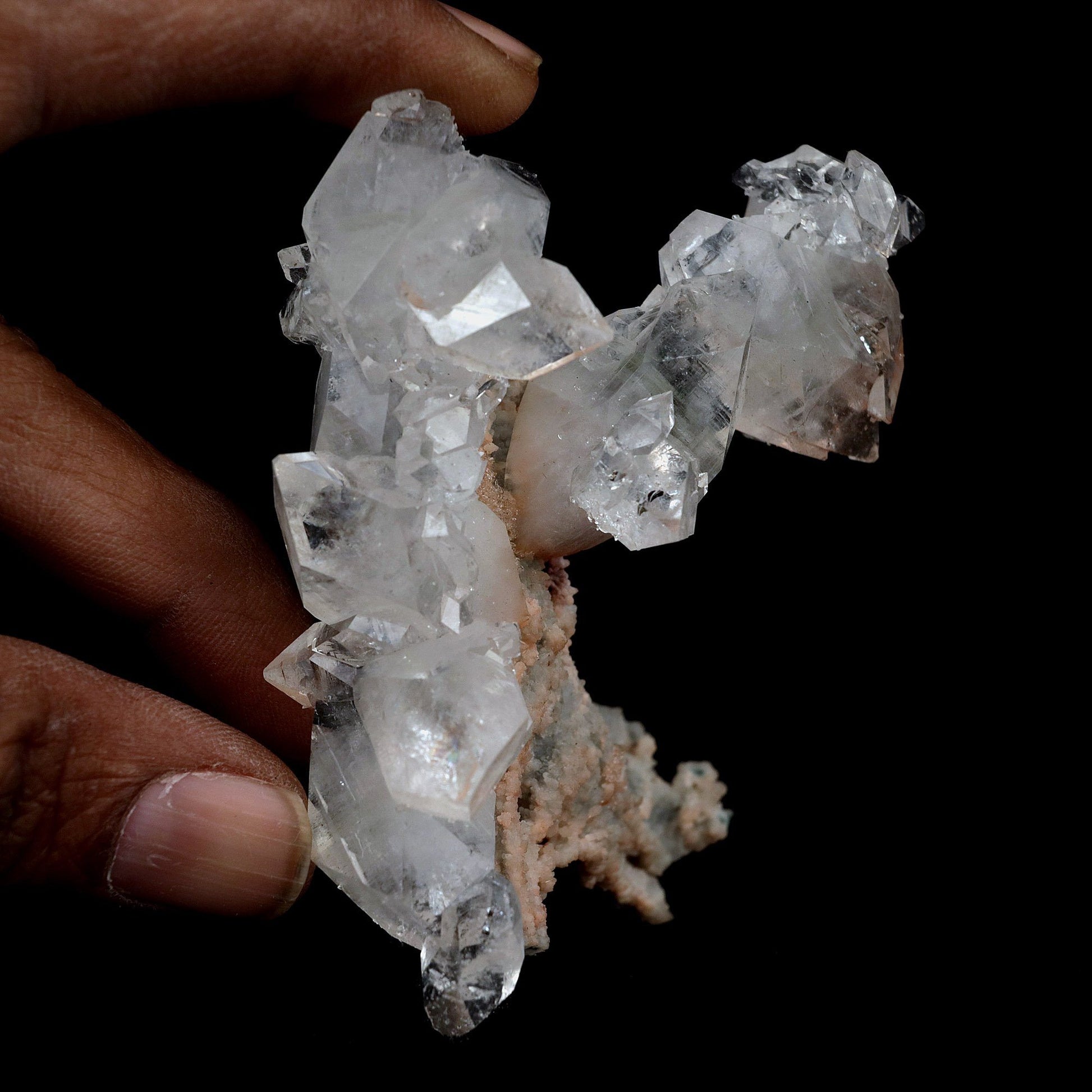 Pointed Apophyllite with Stilbite On Chalcedony Natural Mineral # B 4…  https://www.superbminerals.us/products/pointed-apophyllite-with-stilbite-on-chalcedony-natural-mineral-b-4178  Features:Very fine classic Apophyllite specimen with Stilbite on Quartz from the Jalgaon area Deccan Trap flood Basalts. Sharply formed crystals of Apophyllite, displaying strong development of prism and pyramidal faces. Crystals of Apophyllite have pleasing color less gemmy pyramidal areas due to hematite inclusions