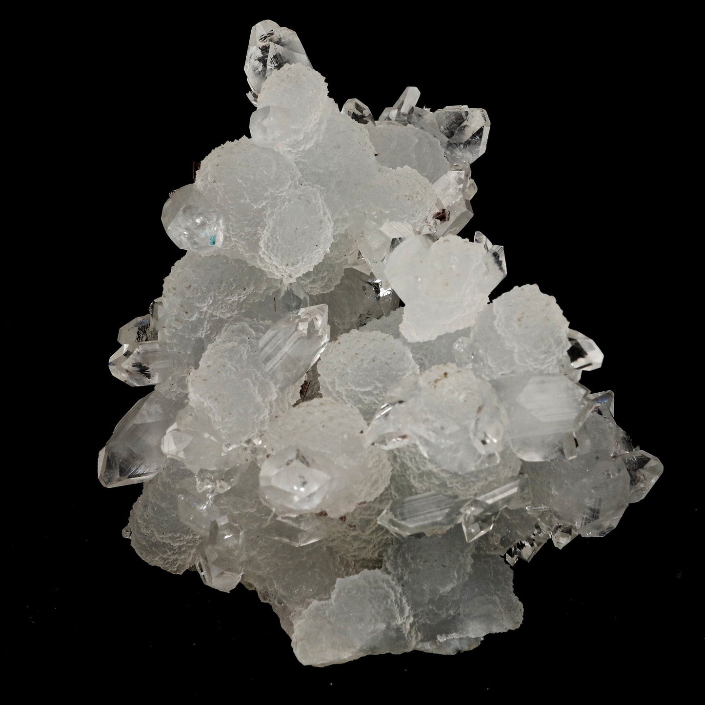 Pointed Clear Apophyllite on Chalcedony Natural Mineral Specimen # B …  https://www.superbminerals.us/products/pointed-clear-apophyllite-on-chalcedony-natural-mineral-specimen-b-5212  Features: One big intersecting doubly-terminated crystal of colorless Apophyllite perched on small plate of white chalcedony Microcrystals. The tip of the smaller crystal is cleaved with a clean surface. Primary Mineral(s): ApophylliteSecondary Mineral(s): N/AMatrix: Chalcedony 3.5 Inch x 3 InchWeight : 302 