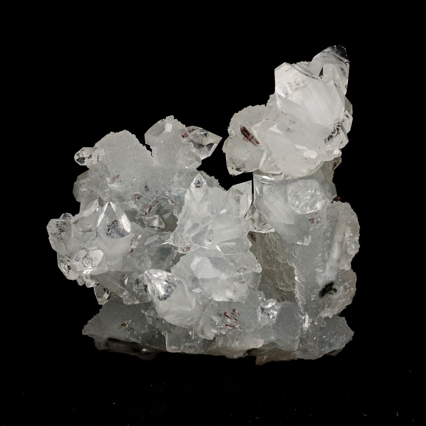 Pointed Clear Apophyllite on Chalcedony Natural Mineral Specimen # B …  https://www.superbminerals.us/products/pointed-clear-apophyllite-on-chalcedony-natural-mineral-specimen-b-5212  Features: One big intersecting doubly-terminated crystal of colorless Apophyllite perched on small plate of white chalcedony Microcrystals. The tip of the smaller crystal is cleaved with a clean surface. Primary Mineral(s): ApophylliteSecondary Mineral(s): N/AMatrix: Chalcedony 3.5 Inch x 3 InchWeight : 302 