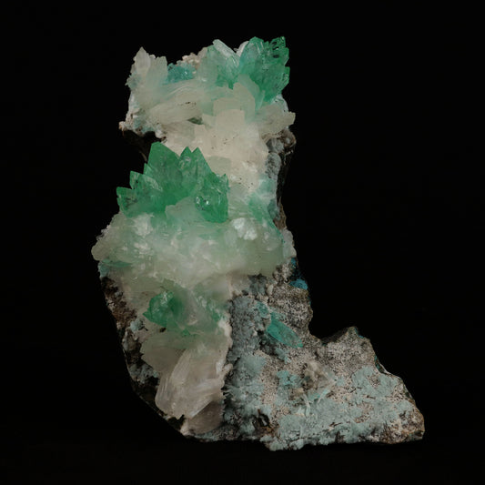 Pointed Green Apophyllite with Stilbite Natural Mineral Specimen # B …  https://www.superbminerals.us/products/pointed-green-apophyllite-with-stilbite-natural-mineral-specimen-b-5093  Features: A beautiful show specimen with crisp, prismatic sea-green Apophyllite crystals on matrix, as well as bladed white "sheaves" of Stilbite on the surface of the crystals.Its Fluorapophyllites are gemmy and glassy, and its mint-green hue is just "more monty" than virtually all other recent discoveries. 