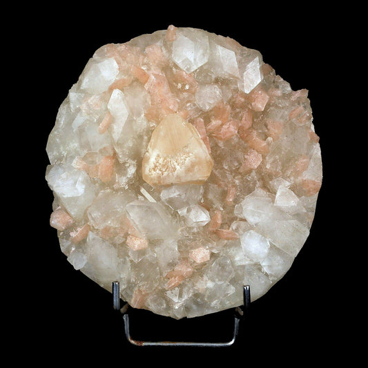 Powellite Fluorescent Mineral with Apophyllite Natural Mineral Specime…  https://www.superbminerals.us/products/powellite-fluorescent-mineral-with-apophyllite-natural-mineral-specimen-b-3682  FeaturesA cluster of colorless apophyllite crystals, unremarkable except for the presence of an orange powellite crystal.&nbsp; Despite the many tonnes of mineral specimens that India produces on an annual basis, these powellites have remained a rarity.&nbsp; This one, though nestled in the apophyllite, 