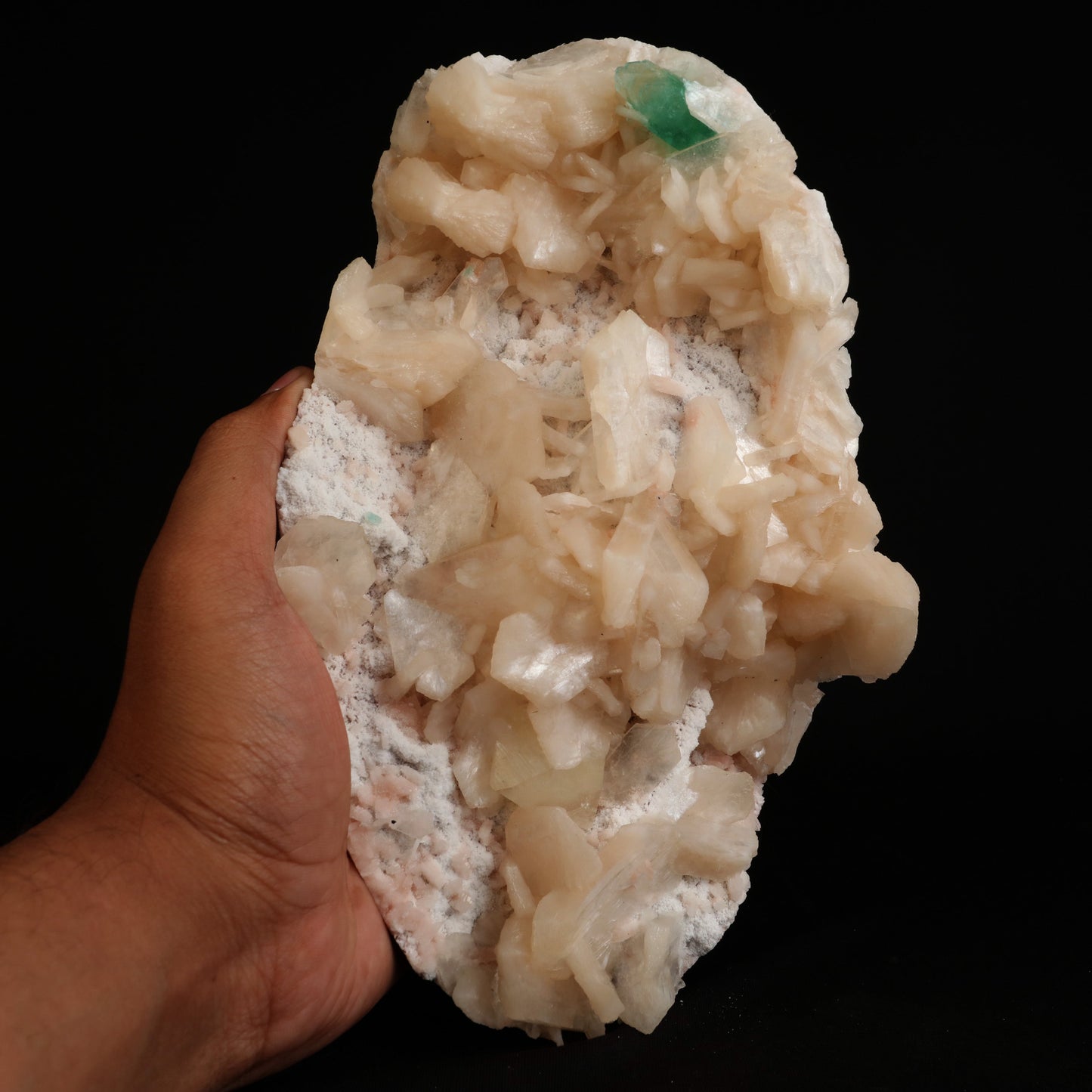 Powellite with Green Apophyllite Stilbite (Rare Find) Natural Mineral …  https://www.superbminerals.us/products/powellite-with-green-apophyllite-stilbite-rare-find-natural-mineral-specimen-b-5013  Features:&nbsp;We have a striking crystal perched elegantly in apophyllite and stilbite crystal nests that are elongated and dramatic! This is a noteworthy specimen in terms of the powellite's own size and the combination's overall appearance. The crystal is a double-terminated, transparent, satiny powellite 