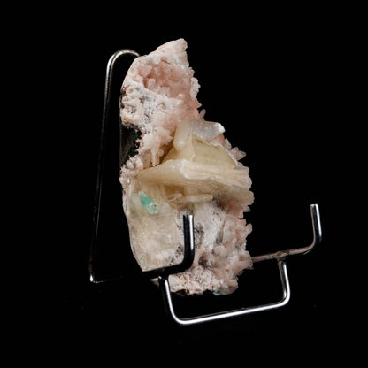 Powellite with Stilbite on Heulandite Natural Mineral Specimen # B 49…  https://www.superbminerals.us/products/powellite-with-stilbite-on-heulandite-natural-mineral-specimen-b-4997  Features: Lustrous powellite crystals in a nest of lustrous, ivory colored stilbite crystals. The powellite crystal fluoresces a bright yellow with stilbite. Very rare and unique specimen.Primary Mineral(s): PowelliteSecondary Mineral(s): StilbiteMatrix: Heulandite 4 Inch x 2 InchWeight : 205 GmsLocality: Nashik
