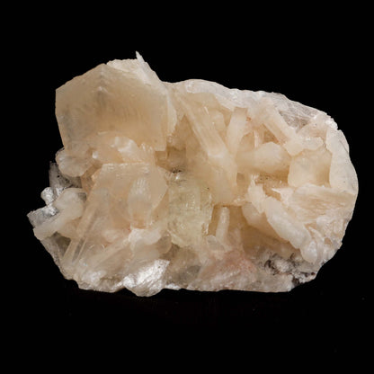 Powellite with Stilbite Rare Find Natural Mineral Specimen # B 4992  https://www.superbminerals.us/products/powellite-with-stilbite-rare-find-natural-mineral-specimen-b-4992  Features:&nbsp;Lustrous powellite crystals in a nest of lustrous, ivory colored stilbite crystals. The powellite crystal fluoresces a bright yellow with stilbite. Very rare and unique specimen.Primary Mineral(s): PowelliteSecondary Mineral(s):&nbsp;N/AMatrix: N/A 3 Inch x 2 InchWeight : 125 GmsLocality: Nashik