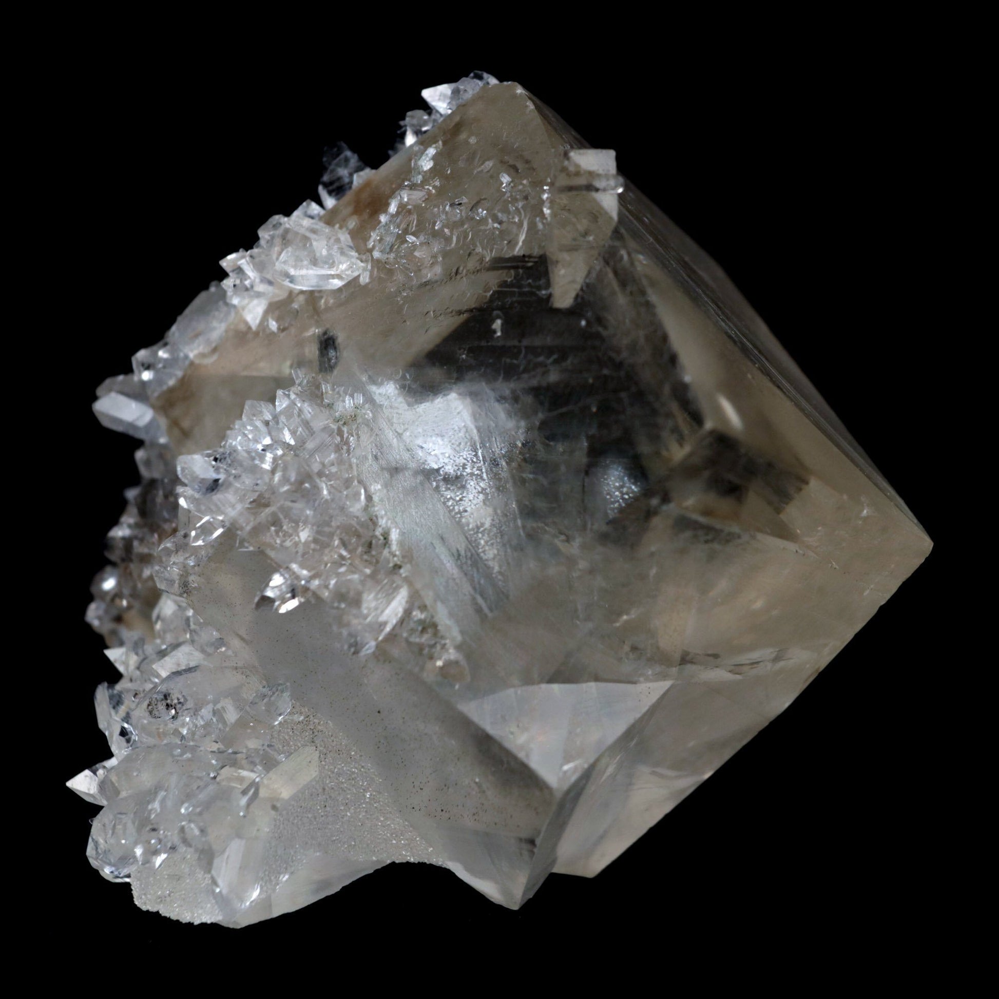 Pseudo Calcite with Apophyllite Natural Mineral Specimen # B 4876  https://www.superbminerals.us/products/calcite-cube-with-apophyllite-natural-mineral-specimen-b-4876  Features: With one of the best Indian Calcites, lustrous Apophyllite, and a truly excellent combo piece, this is truly exceptional.&nbsp;The Calcite in the middle of the piece is quite gorgeous on the front edge, with outstanding brilliance and gemminess.&nbsp;The front edge serves as the primary