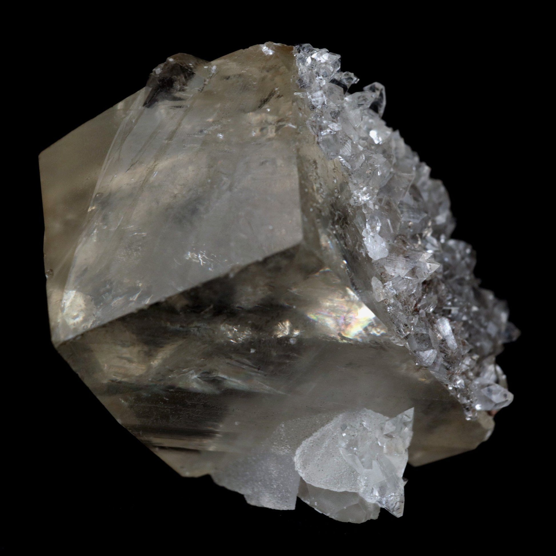 Pseudo Calcite with Apophyllite Natural Mineral Specimen # B 4876  https://www.superbminerals.us/products/calcite-cube-with-apophyllite-natural-mineral-specimen-b-4876  Features: With one of the best Indian Calcites, lustrous Apophyllite, and a truly excellent combo piece, this is truly exceptional.&nbsp;The Calcite in the middle of the piece is quite gorgeous on the front edge, with outstanding brilliance and gemminess.&nbsp;The front edge serves as the primary