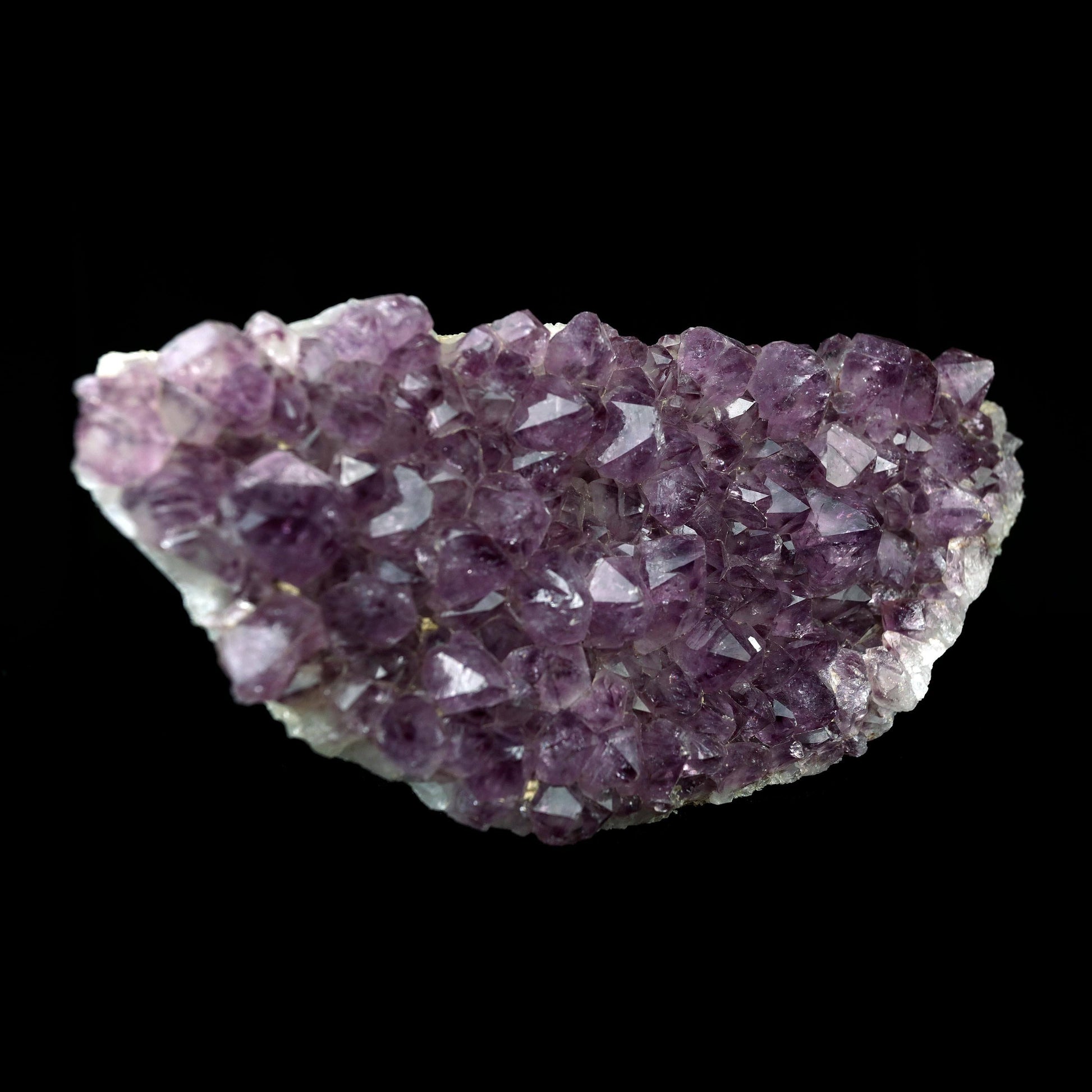 Purple Amethyst Plate Natural Mineral Specimen # B 4374  https://www.superbminerals.us/products/purple-amethyst-plate-natural-mineral-specimen-b-4374  Features:A very large plate of lustrous, large deep-purple Amethyst crystals with two clusters (one large and one smaller) of highly translucent, colorless, intergrown parallel “nailhead spar” crystals emanating from the center of the plate of Amethyst. It is incredible! Amazing color, luster, symmetry and crystal 
