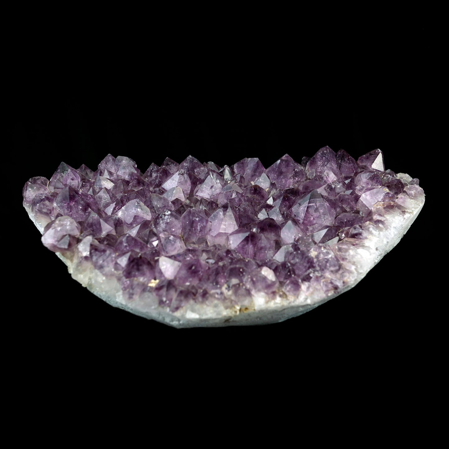 Purple Amethyst Plate Natural Mineral Specimen # B 4374  https://www.superbminerals.us/products/purple-amethyst-plate-natural-mineral-specimen-b-4374  Features:A very large plate of lustrous, large deep-purple Amethyst crystals with two clusters (one large and one smaller) of highly translucent, colorless, intergrown parallel “nailhead spar” crystals emanating from the center of the plate of Amethyst. It is incredible! Amazing color, luster, symmetry and crystal 