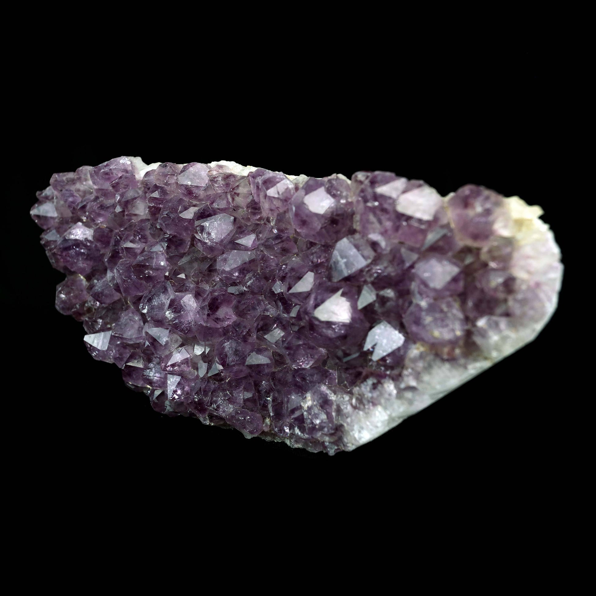 Purple Amethyst Plate Natural Mineral Specimen # B 4374  https://www.superbminerals.us/products/purple-amethyst-plate-natural-mineral-specimen-b-4374  Features:A very large plate of lustrous, large deep-purple Amethyst crystals with two clusters (one large and one smaller) of highly translucent, colorless, intergrown parallel “nailhead spar” crystals emanating from the center of the plate of Amethyst. It is incredible! Amazing color, luster, symmetry and crystal 