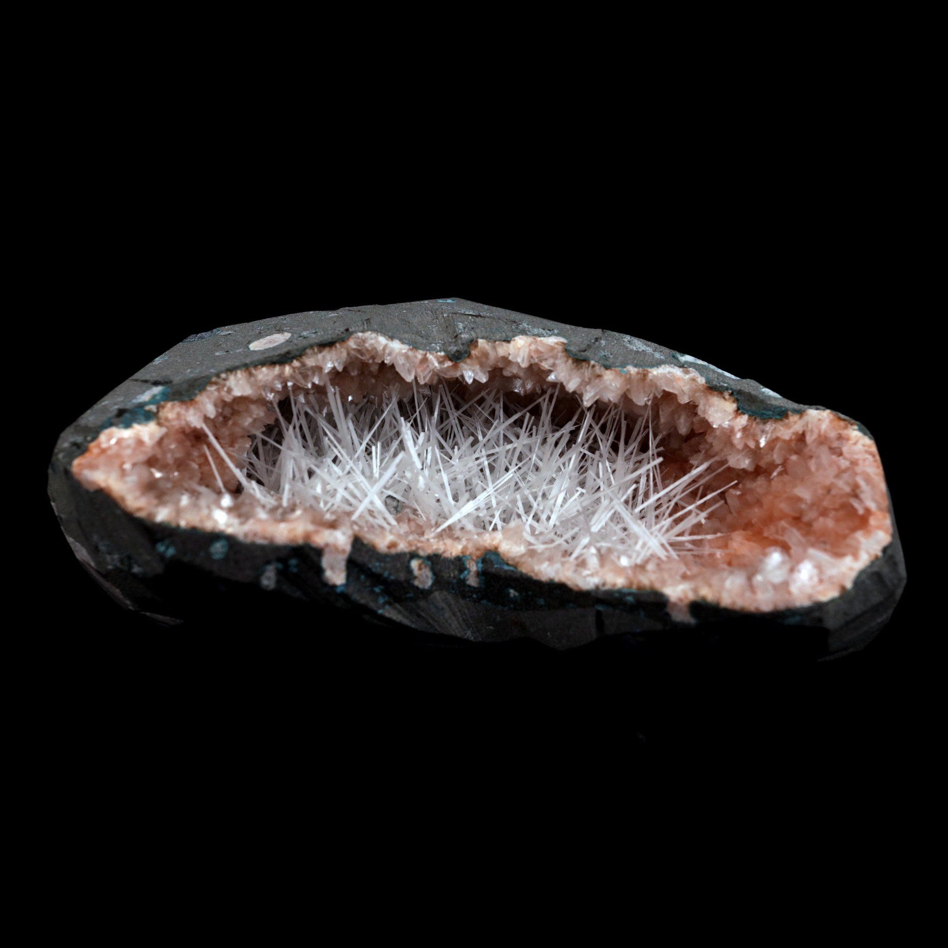 Scolecite Accular Sprays Inside Heulandite Geode Natural Mineral Speci…  https://www.superbminerals.us/products/scolecite-accular-sprays-inside-heulandite-geode-natural-mineral-specimen-b-4901  Features: Decorative geode encircled with beige, glossy Heulandite crystals, this piece has a pleasing aesthetic appearance. The crystals have a well-defined sheen that is pearly, almost glassy in appearance. This item has a lot of glimmer to it. The condition is excellent. Primary Mineral(s): Scolecite