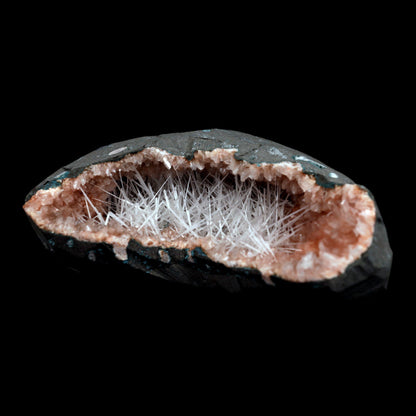 Scolecite Accular Sprays Inside Heulandite Geode Natural Mineral Speci…  https://www.superbminerals.us/products/scolecite-accular-sprays-inside-heulandite-geode-natural-mineral-specimen-b-4901  Features: Decorative geode encircled with beige, glossy Heulandite crystals, this piece has a pleasing aesthetic appearance. The crystals have a well-defined sheen that is pearly, almost glassy in appearance. This item has a lot of glimmer to it. The condition is excellent. Primary Mineral(s): Scolecite