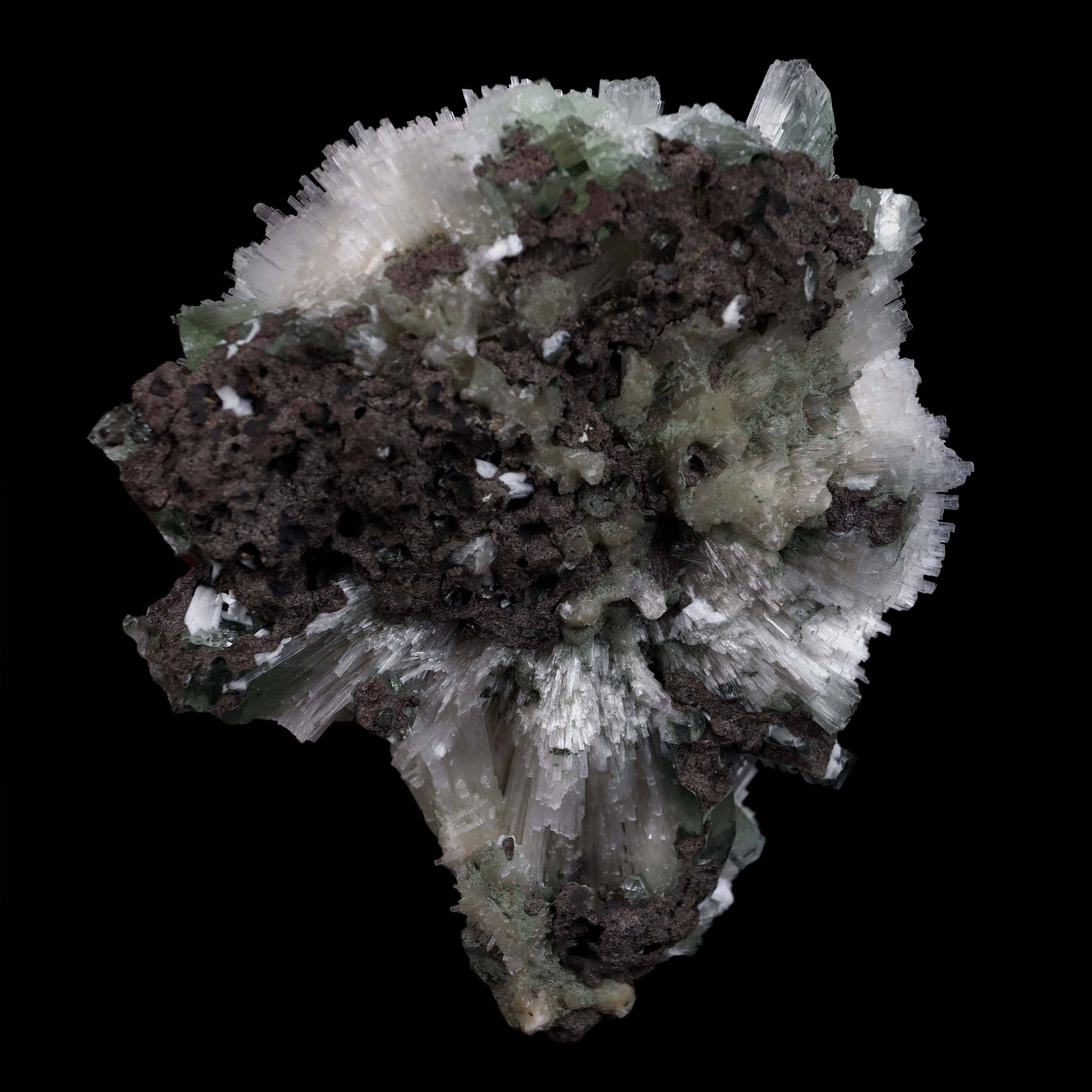 Scolecite Galssy Spehere with Apophyllite Natural Mineral Specimen # …  https://www.superbminerals.us/products/scolecite-galssy-spehere-with-apophyllite-natural-mineral-specimen-b-4609  Features: A rich porcupine quill spray of glassy scolecite needles is artfully placed over a basalt substrate coated in mint-green, frosted Tetragonal Apophyllite crystals.Large combination material that is both exceptional and uncommon in today's market. Primary Mineral(s): Scolecite