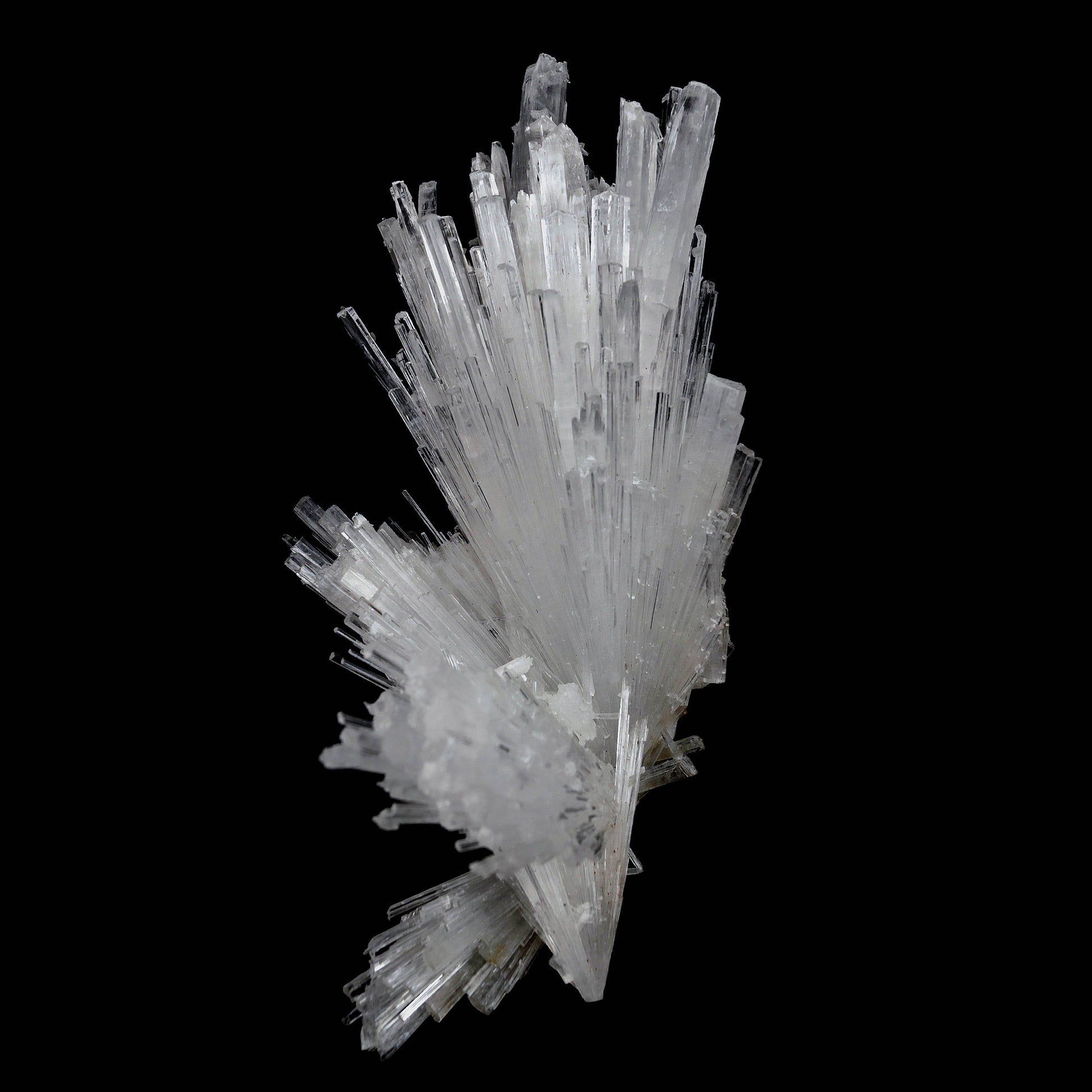 Scolecite Glassy Spray Natural Mineral Specimen # B 4608  https://www.superbminerals.us/products/scolecite-glassy-spray-natural-mineral-specimen-b-4608  Features: A large, tapered spray of elongated colorless Scolecite crystals. The Scolecite crystals are glassy and highly translucent with transparent terminations. A beautiful specimen in excellent condition.Primary Mineral(s): Scolecite