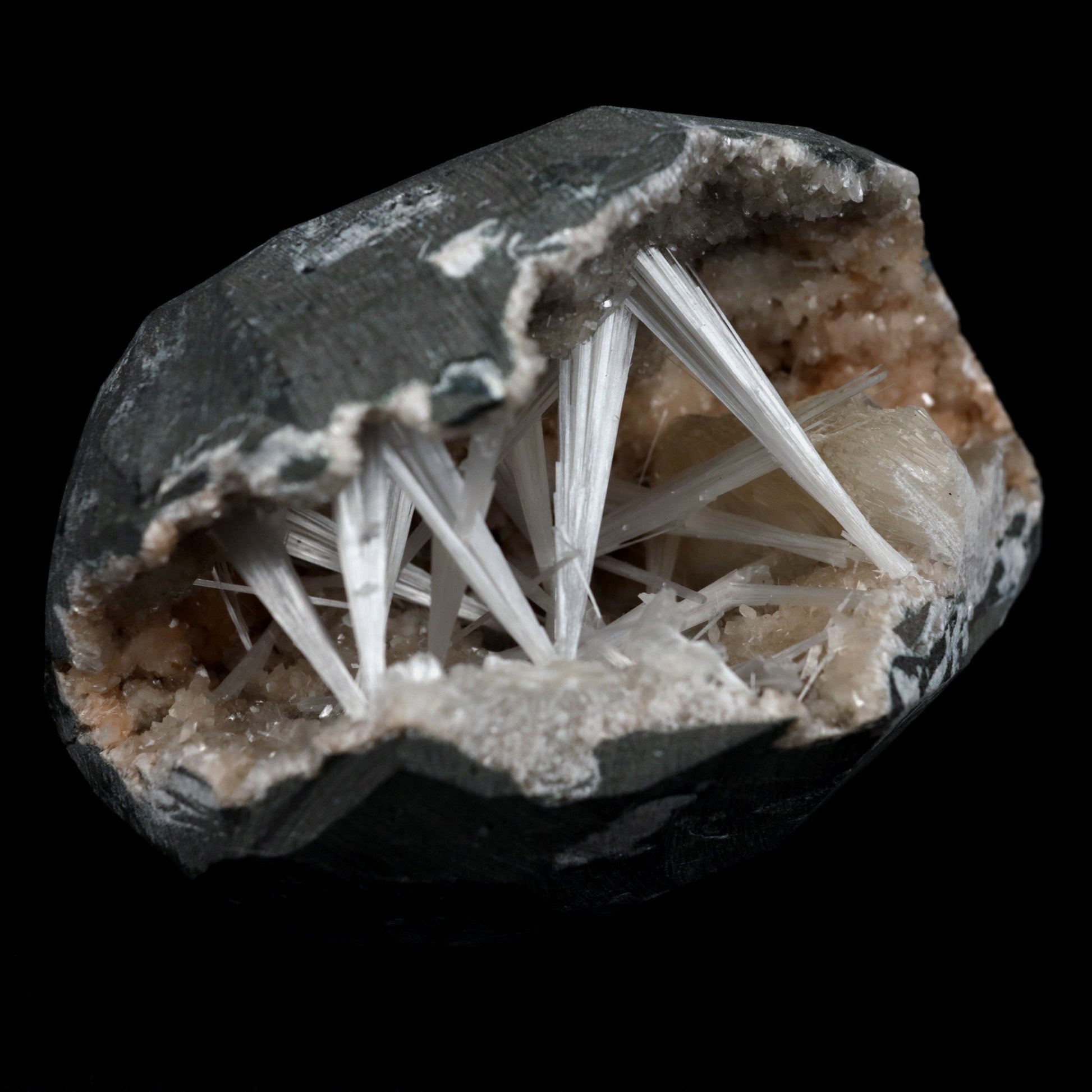 Scolecite Intergrown Sprays Inside Heulandite Geode Natural Mineral Sp…  https://www.superbminerals.us/products/scolecite-intergrown-sprays-inside-heulandite-geode-natural-mineral-specimen-b-4792  Features: A huge Geode with beige Heulandite crystals and a conspicuous radial spray of glossy, colourless, extremely transparent, acicular (needle-like) Scolecite crystals throughout, as well as numerous solitary Scolecite crystals.